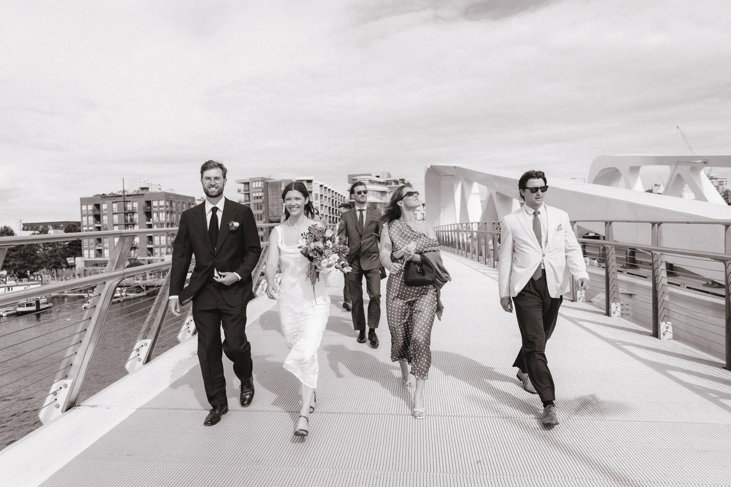 It&rsquo;s time to get married! Our wedding party off to the ceremony location across the Johnson Street Bridge! #yyjweddings #weddingphotography #bcweddings #vancouverislandwedding #canadianweddingphotographer