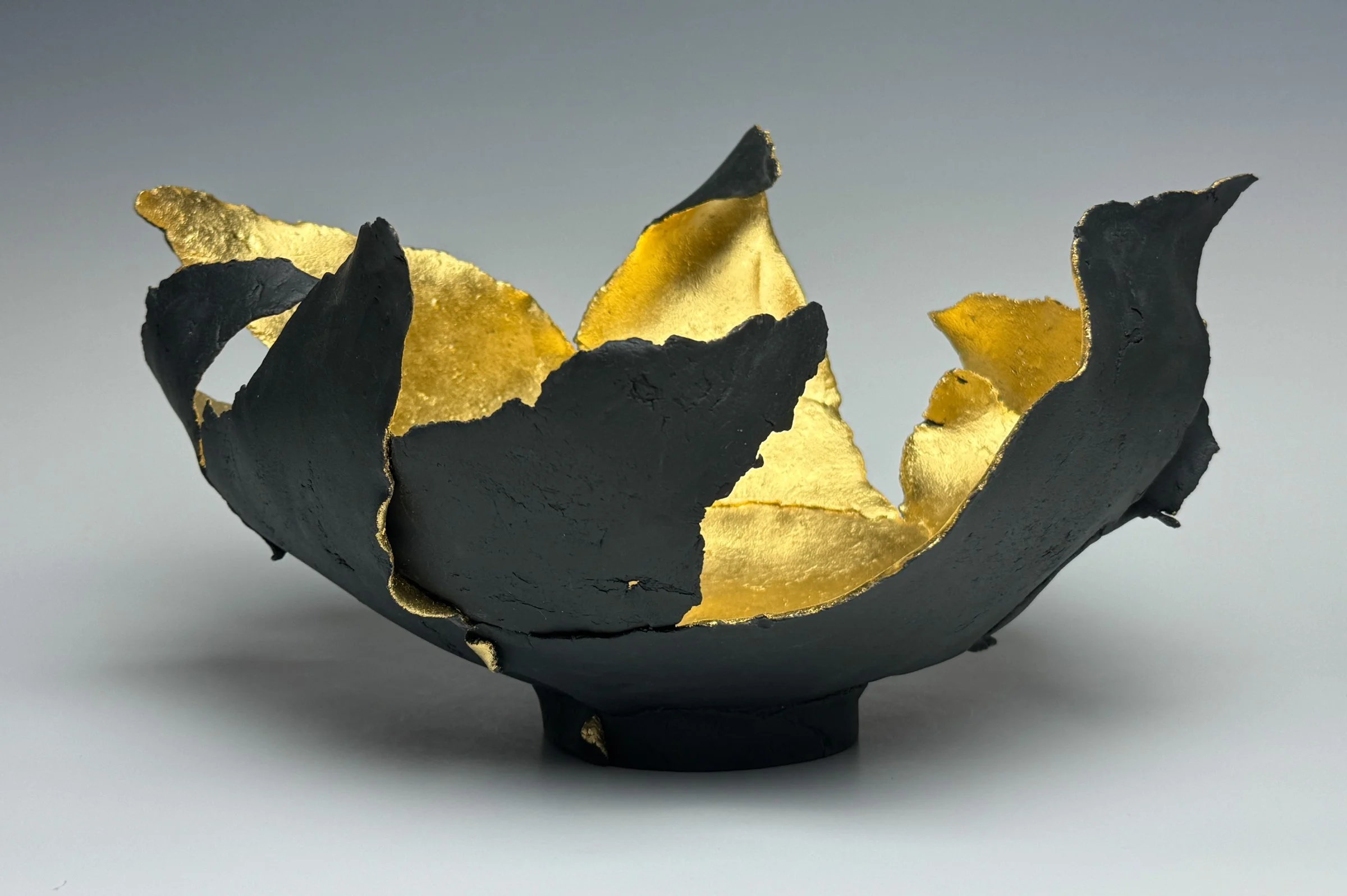 Ignited
7.5" x 14" x 13" 
Custom Black Porcelain, 23.75K Gold Leaf