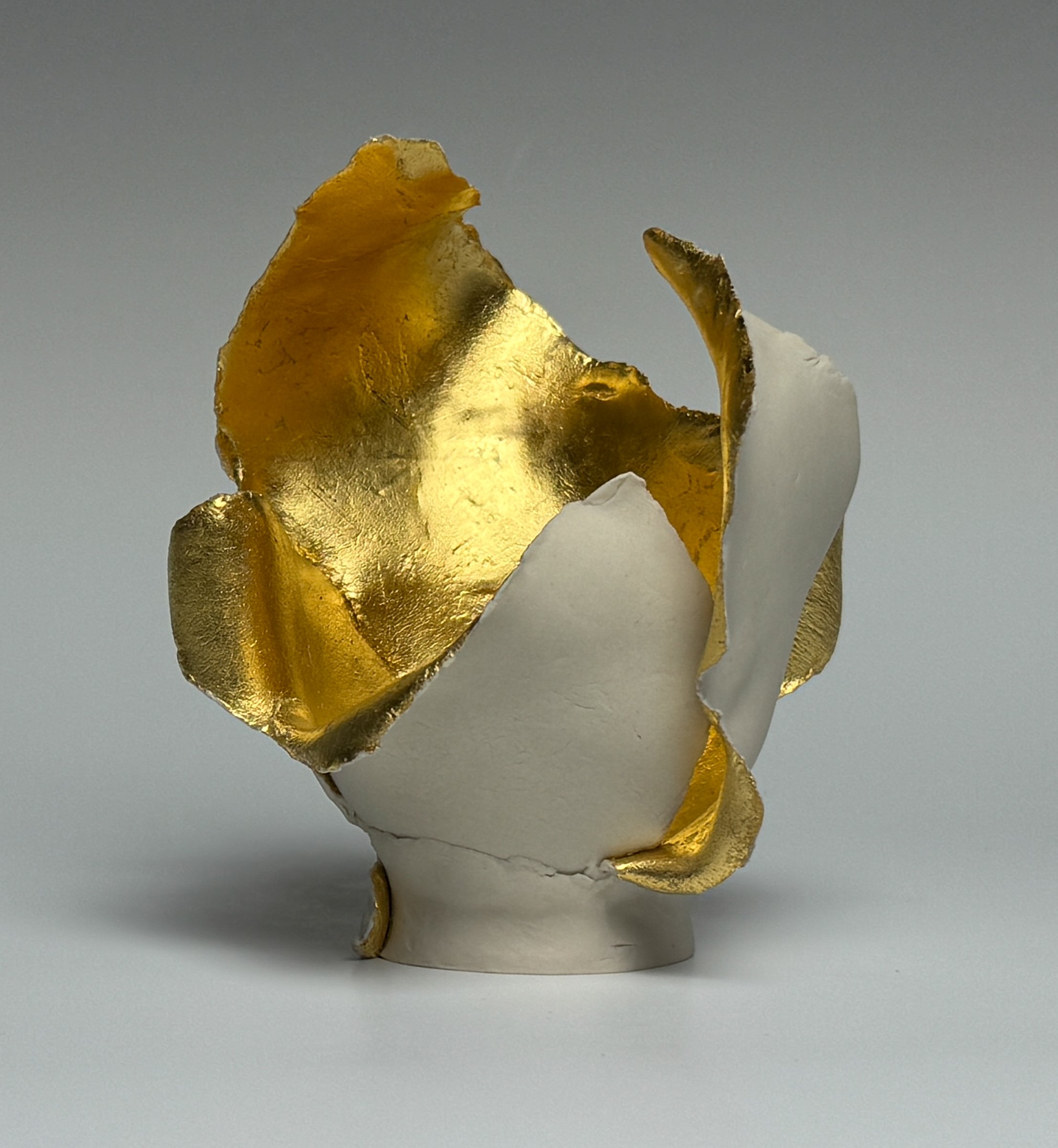 Delicate Beauty	, Small Works Series
4.75" H x 4" x 4.5"		
Porcelain, 23.75K Gold Leaf, Cone 6, Oxidation