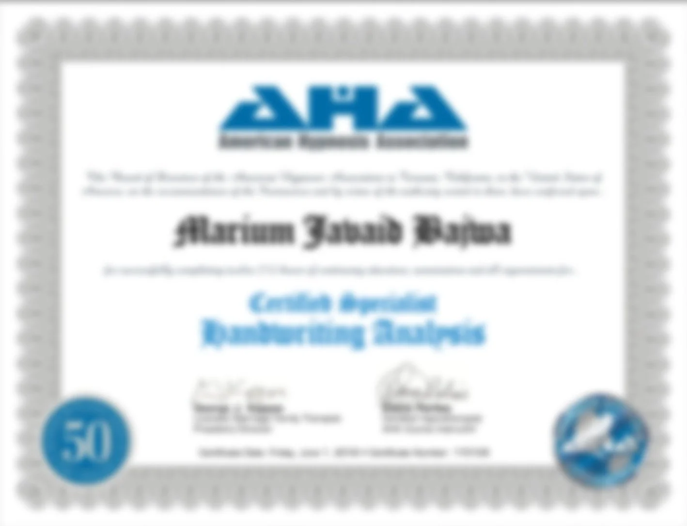 Blurry certificate or diploma, with blue and black text, and a blue circular emblem in the lower left corner.