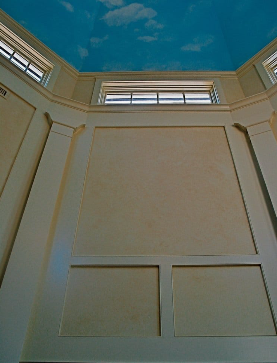 Sky ceiling, suede textured finish on paneled wall inserts
