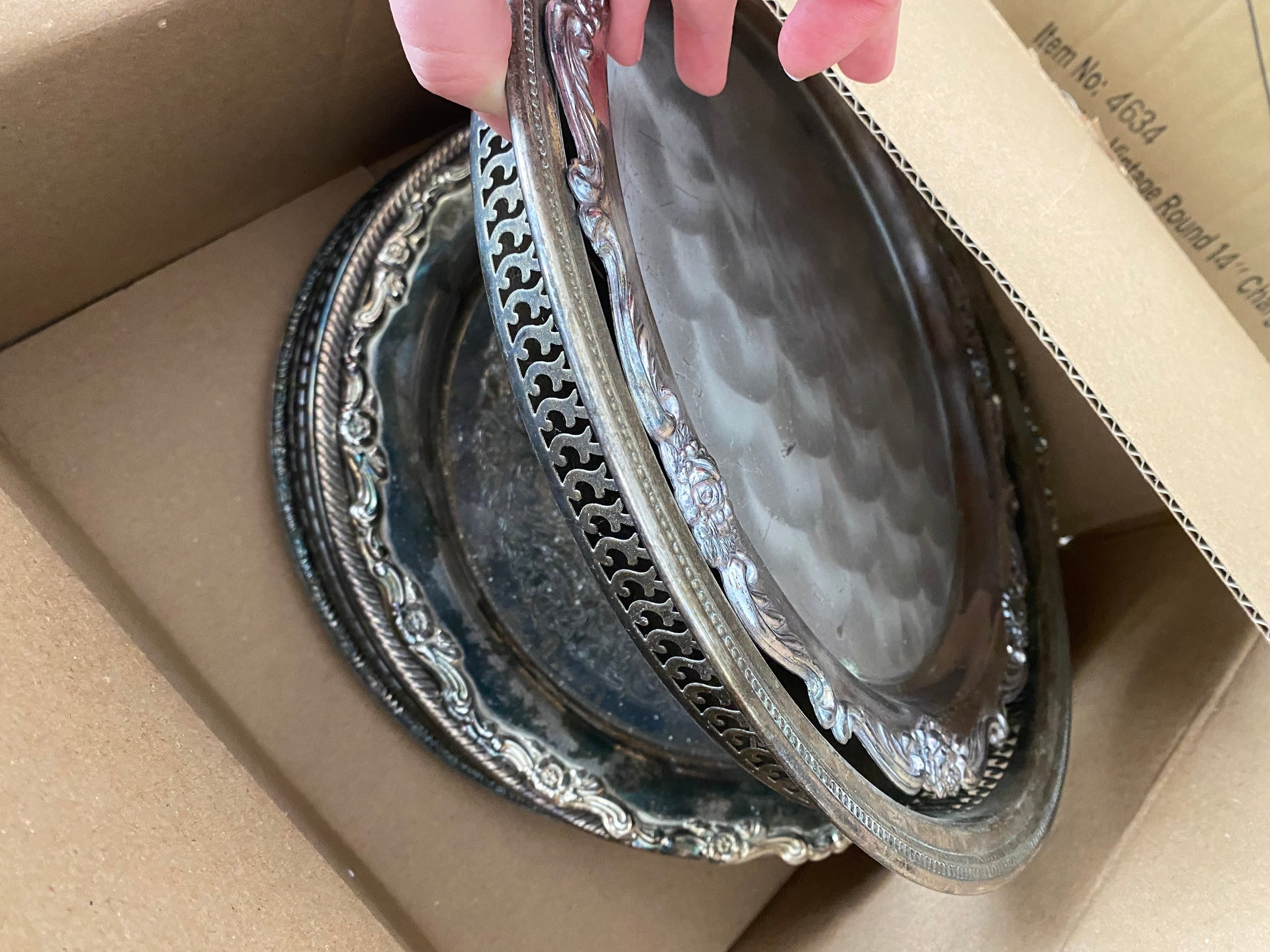 $50 - Antique Silver Serving trays. 9 Total. (All different designs & have tarnish patina)
