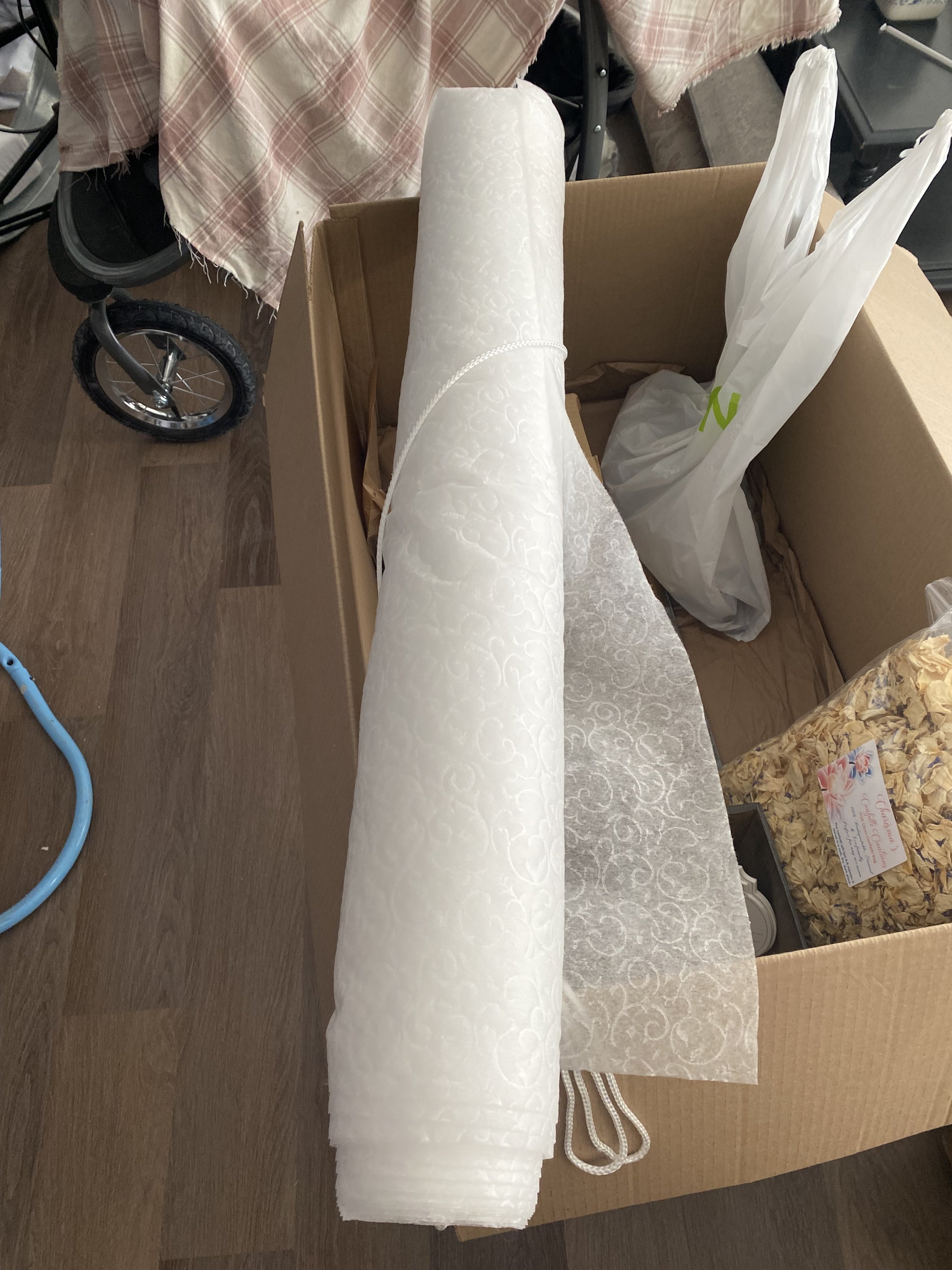 $35 - Aisle Runner; Never used; We unrolled several feet before deciding it was too windy to use it.I -thought- it got a very small tear on the edge in the process, but have been unable to find it…