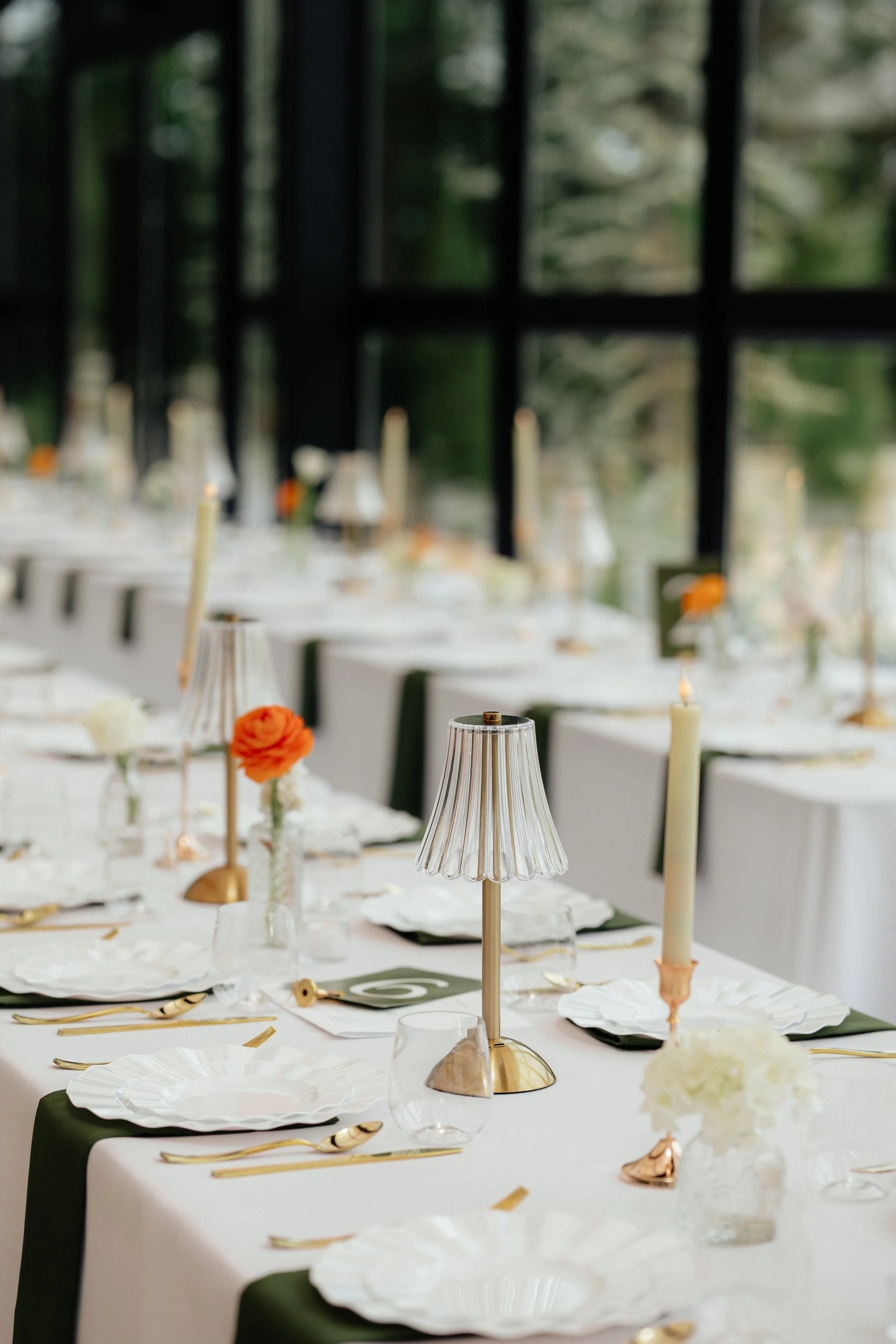 Romantic wedding reception florals with garden-inspired arrangements and timeless styling.
