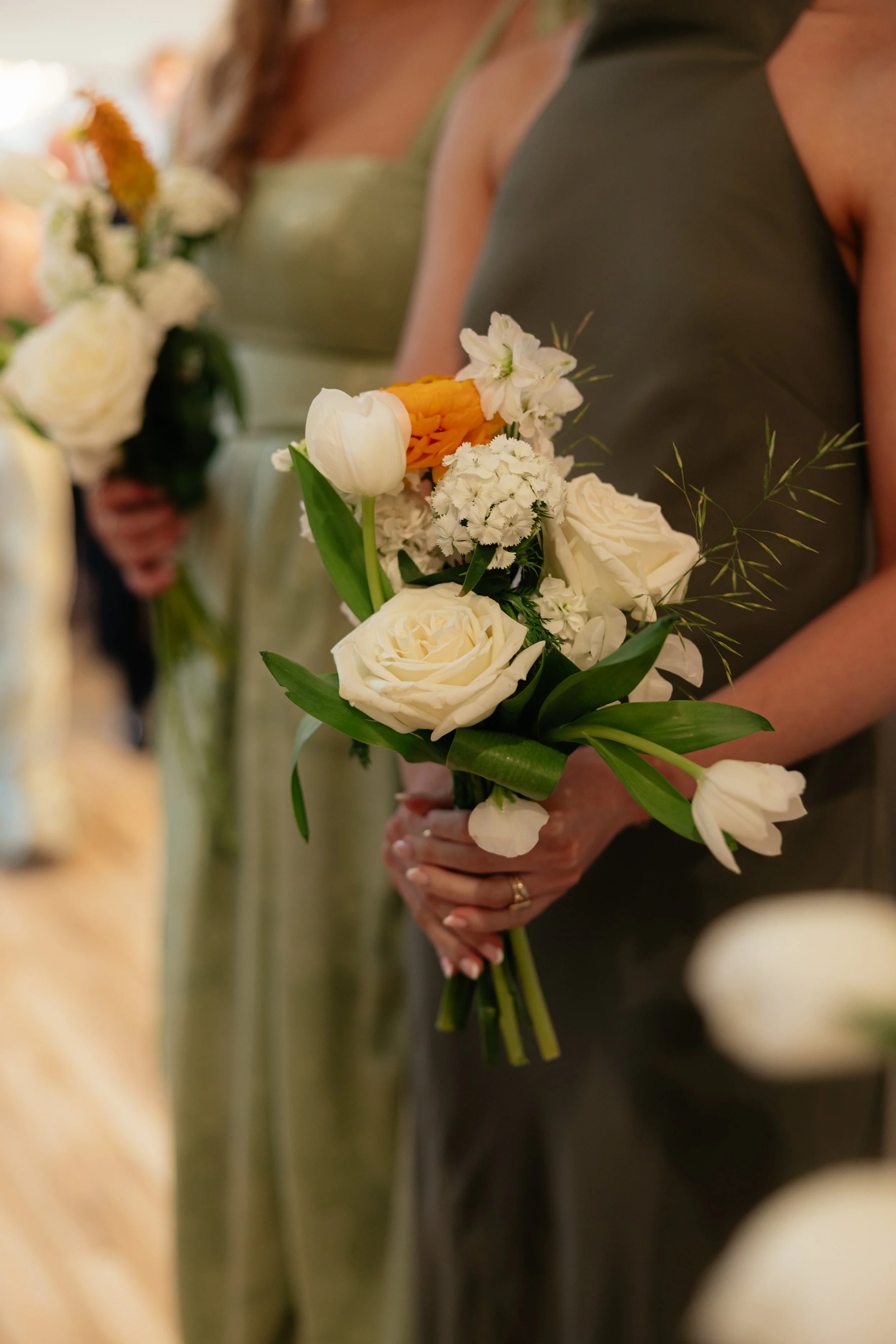 Kansas City wedding florist Holland Florals creating personalized floral designs for a romantic celebration.