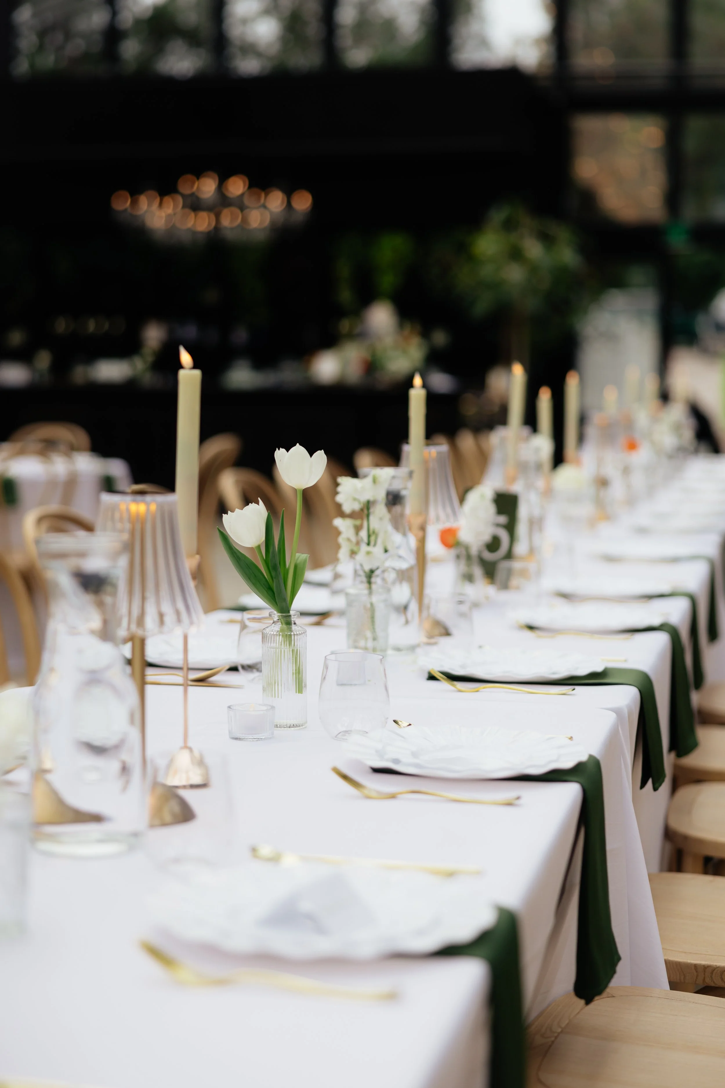 Romantic wedding reception florals with garden-inspired arrangements and timeless styling.
