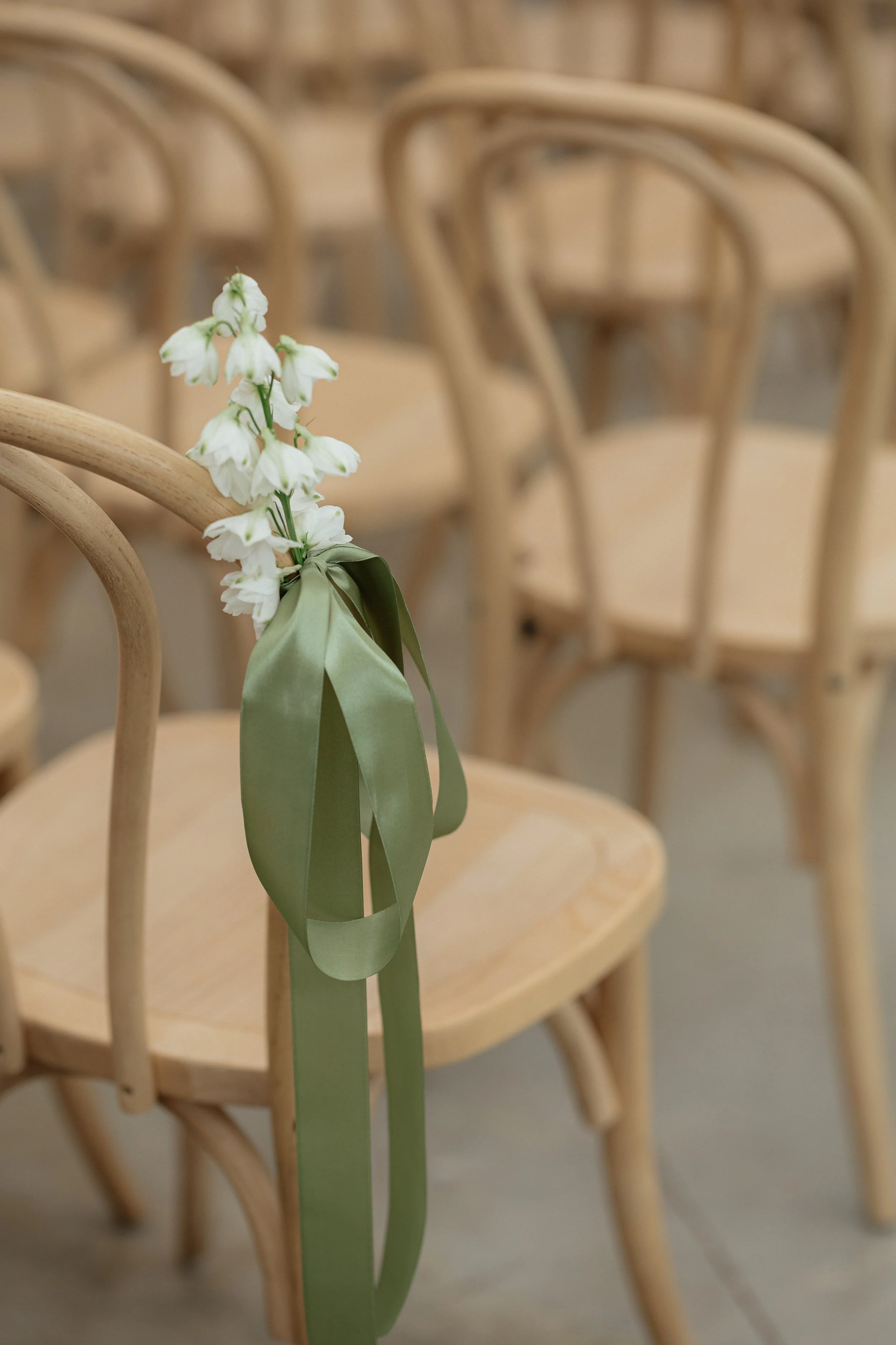 Romantic wedding reception florals with garden-inspired arrangements and timeless styling.