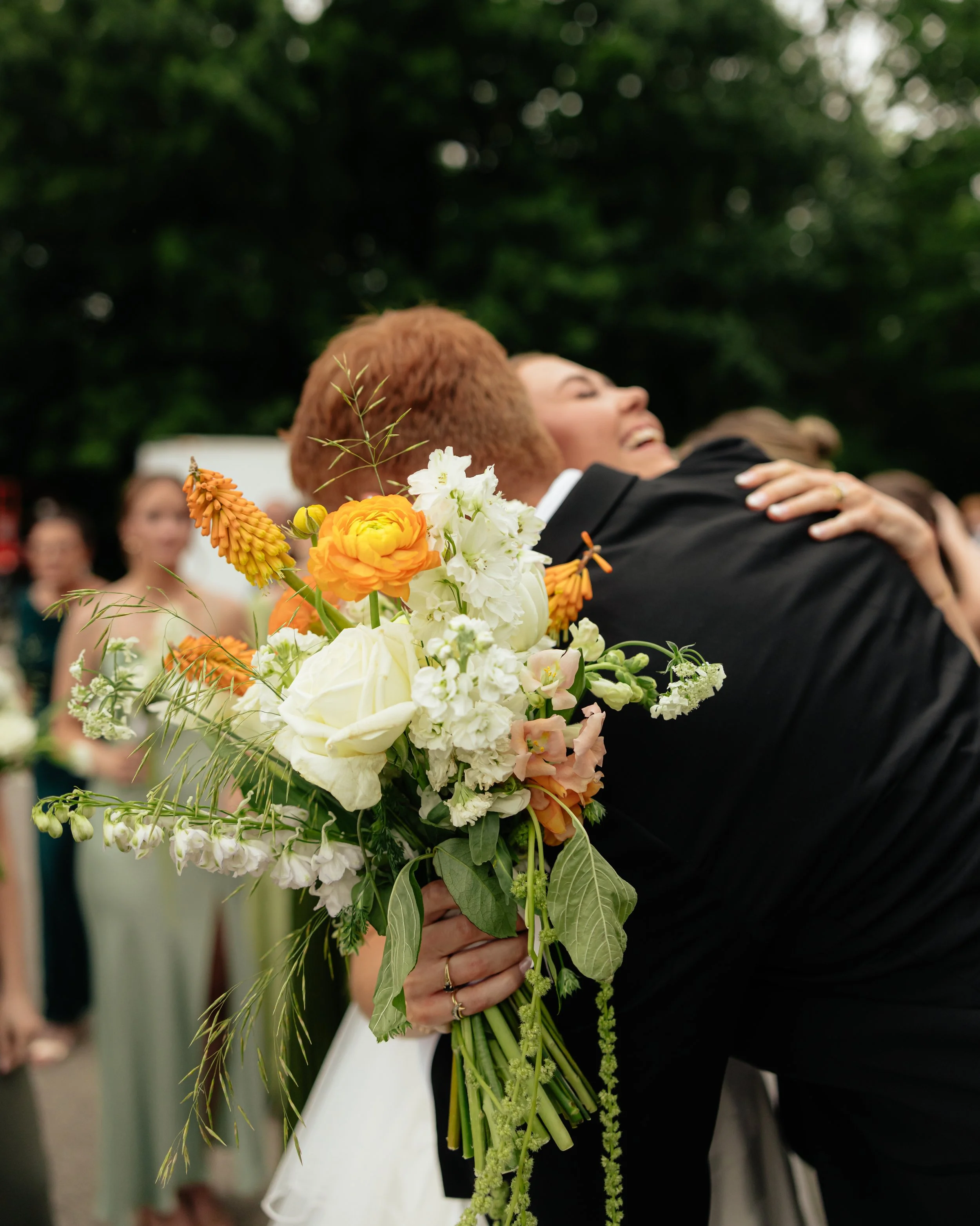 Kansas City wedding florist Holland Florals creating personalized floral designs for a romantic celebration.