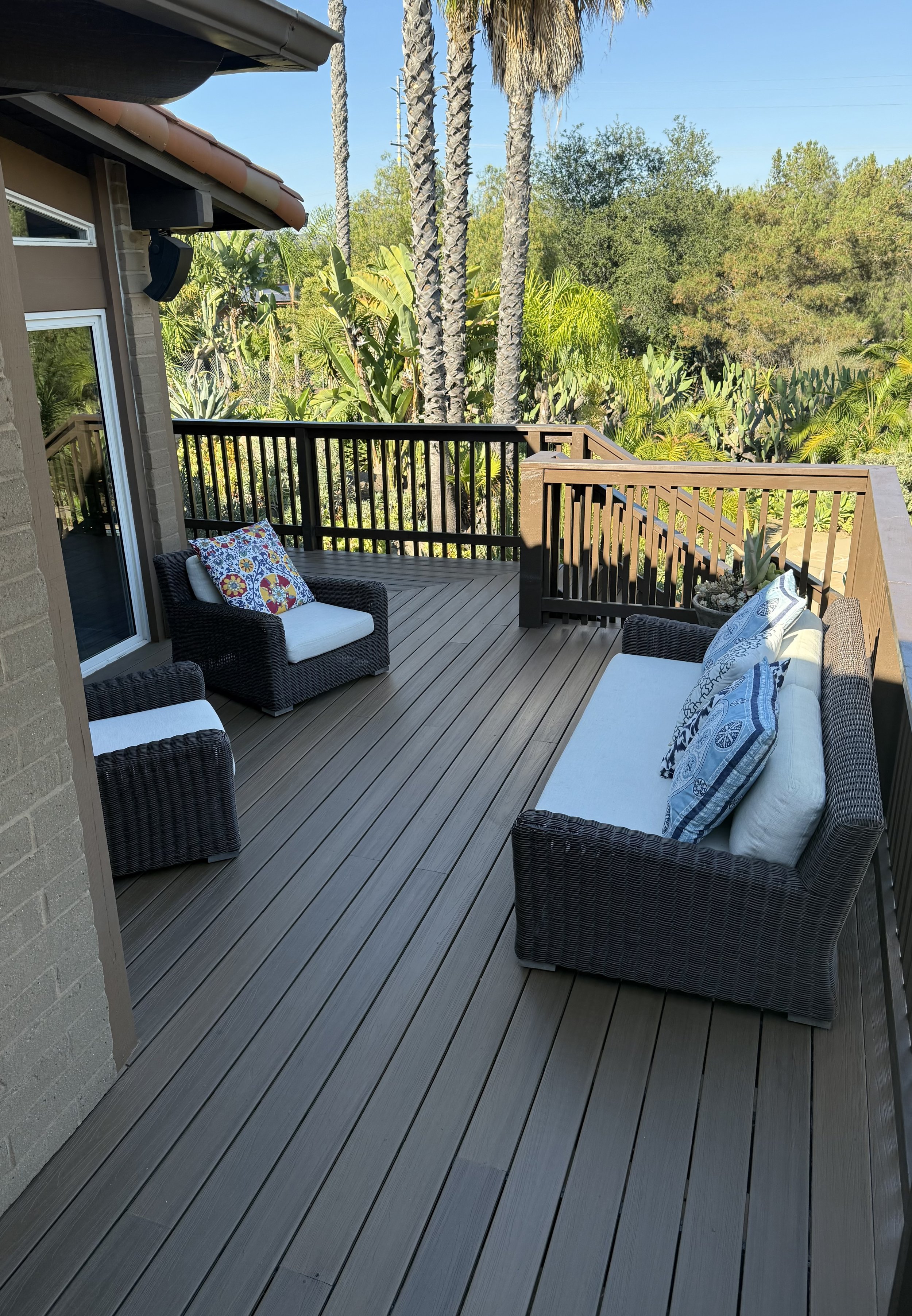 Custom trex deck with built-in railing designed for outdoor living in Poway