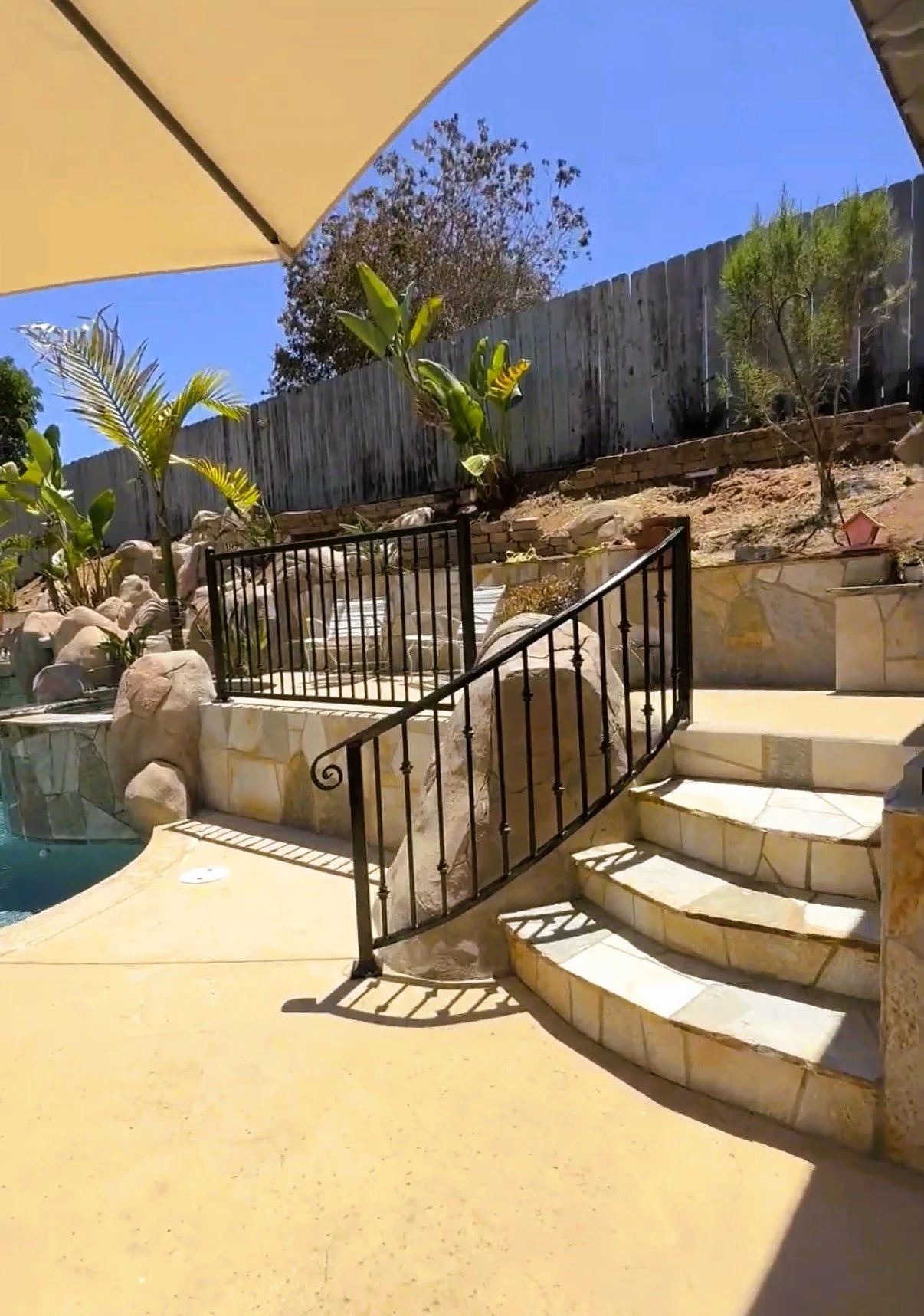 Custom iron stair railing installed for an outdoor renovation in San Diego, CA.