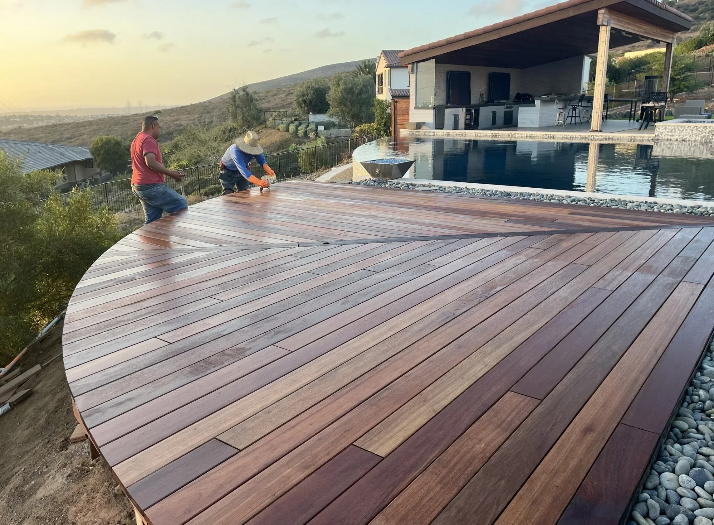 Custom Mangaris hardwood deck with curved design in Rancho Santa Fe, CA.
