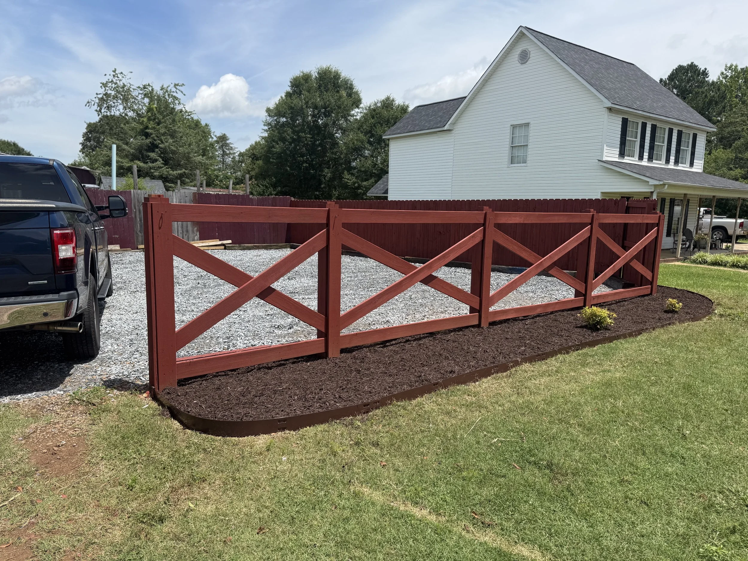 Gravel Parking Pad, Flowerbed Development, & Fence Staining