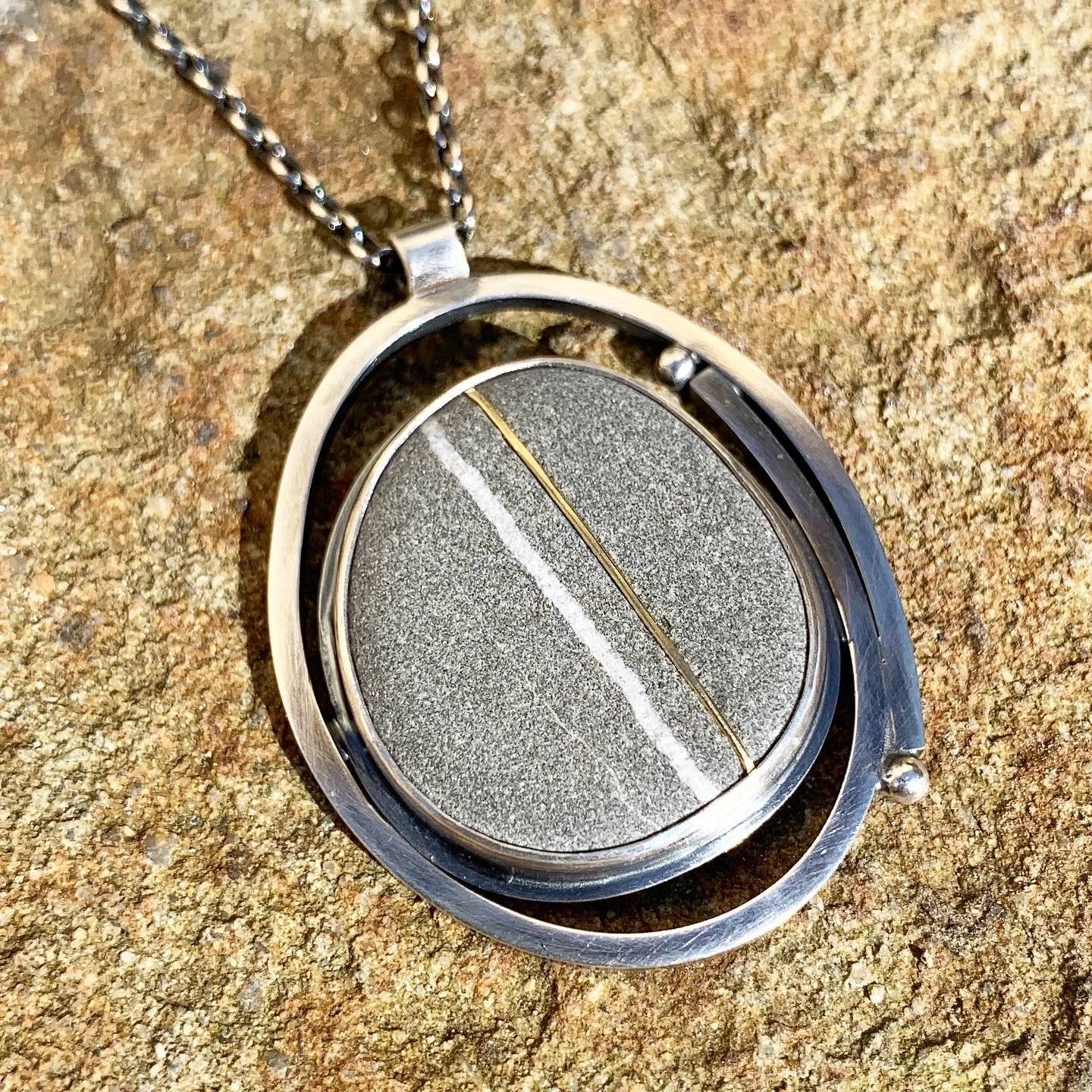 Sea stone Pendant with inlaid 22k gold by Monica Cardone