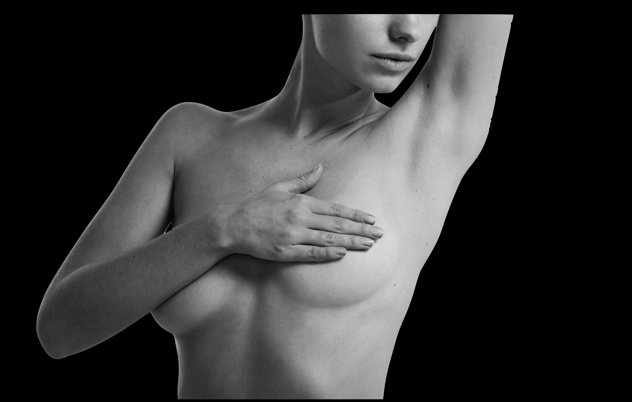 Totale borstreconstructie door Dr Karl Waked na mastectomie met behulp van een borstimplantaat, lipofilling of een vrije flap