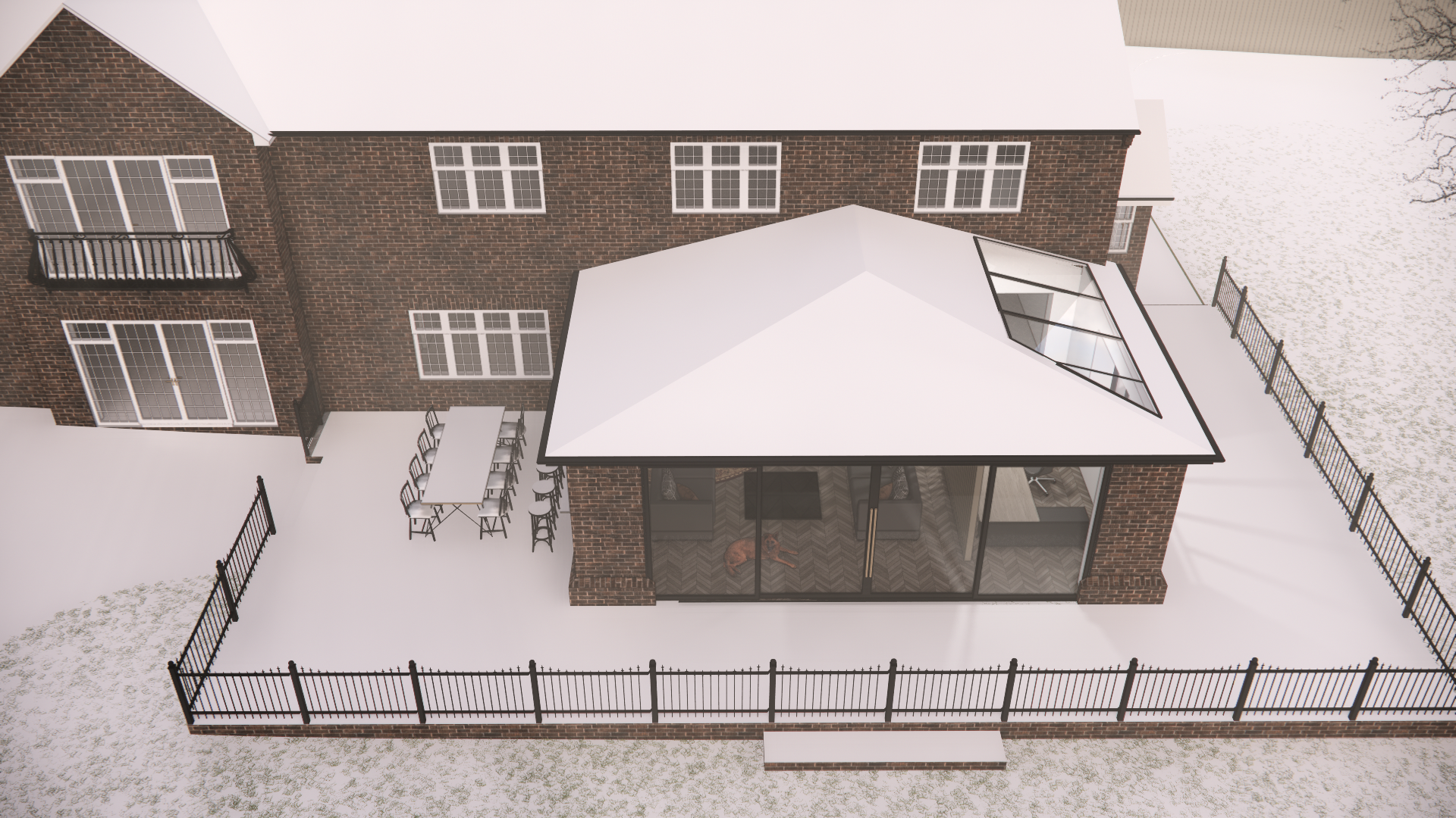 A two-story brick house with a fenced backyard, outdoor dining area, and a room with glass walls and a desk inside.