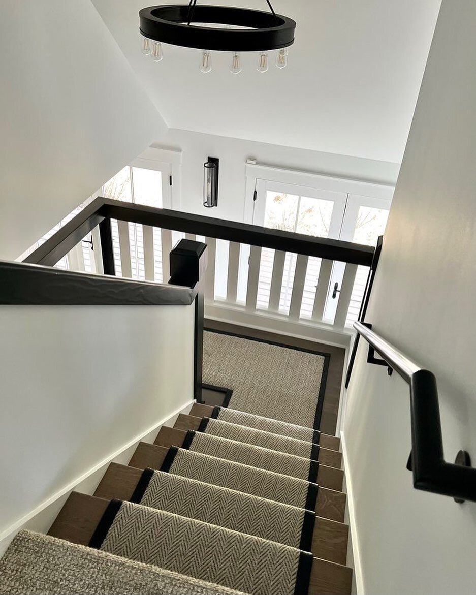 We&rsquo;re loving this herringbone runner on this modern farmhouse staircase.