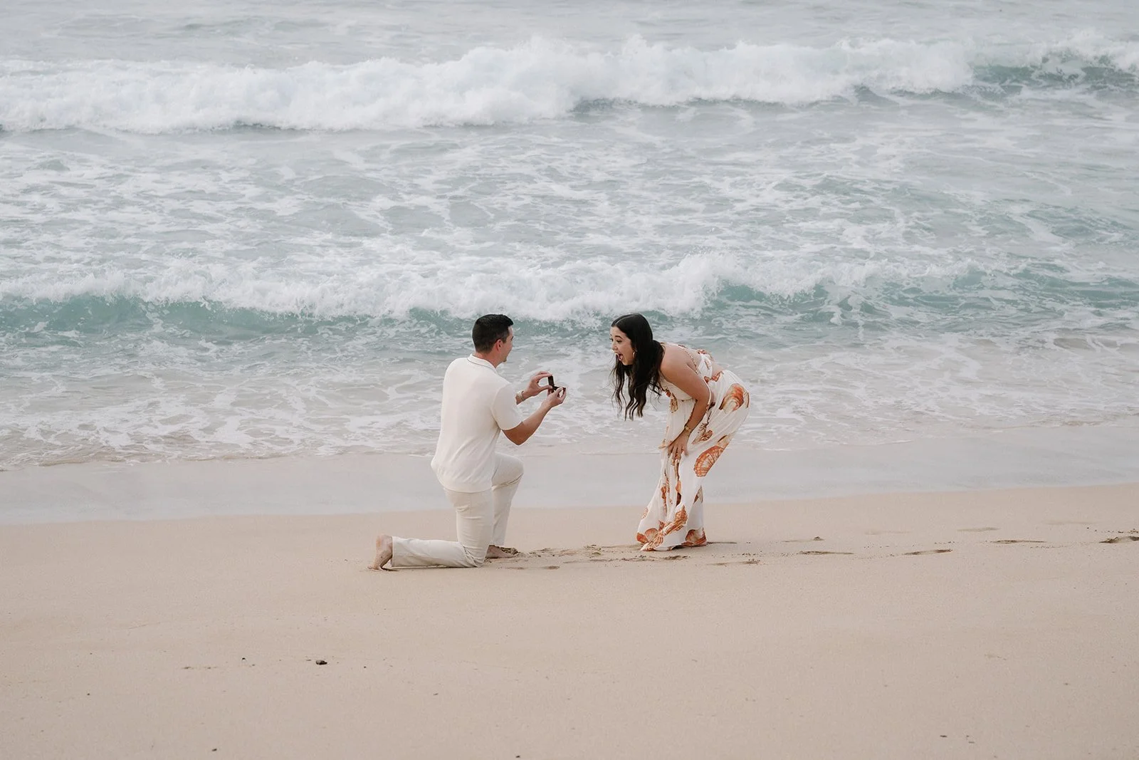 emotional surprise proposal at Ironwoods beach, Maui