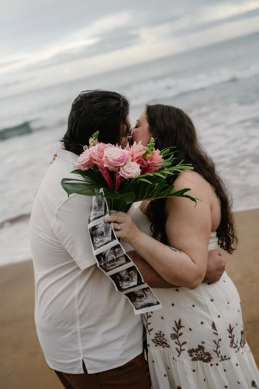 Pregnancy announcement photos and gender reveal with tropical Maui flowers
