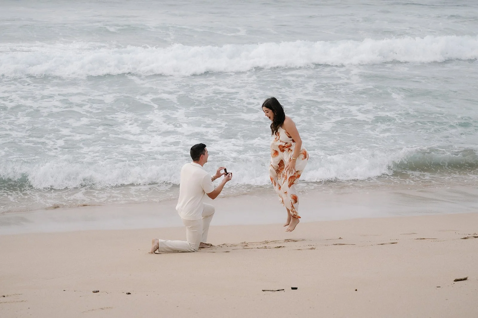 Emotional surprise engagement at Ironwoods beach, maui