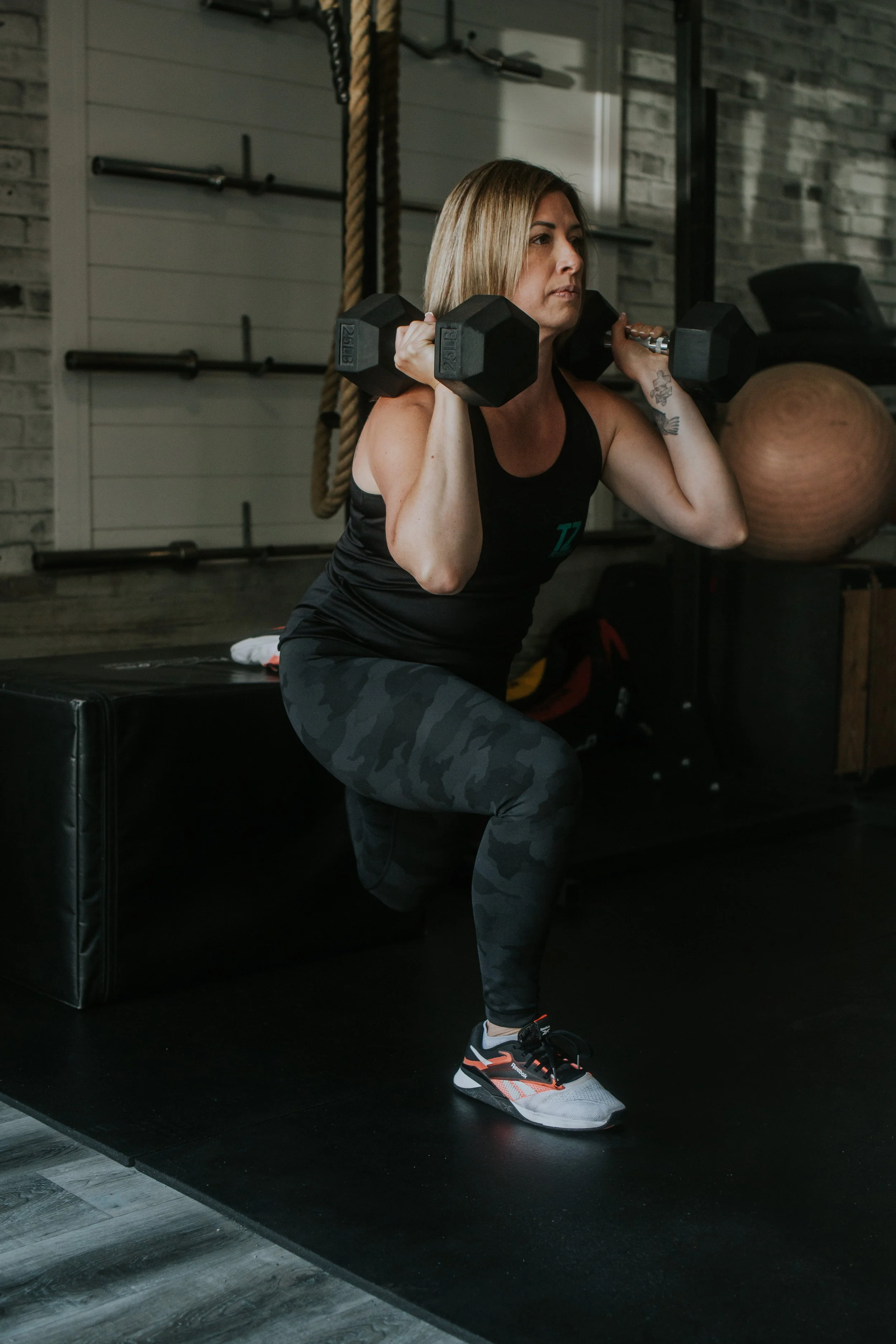 Personal trainer Tara Zorn demonstrating a strength exercise