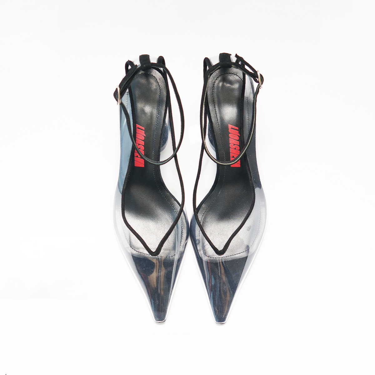 Overhead view of Lucasheva Translucent Style Pumps showcasing the combination of see-through PVC and black suede materials with a sleek pointed toe. | LUCASHEVA