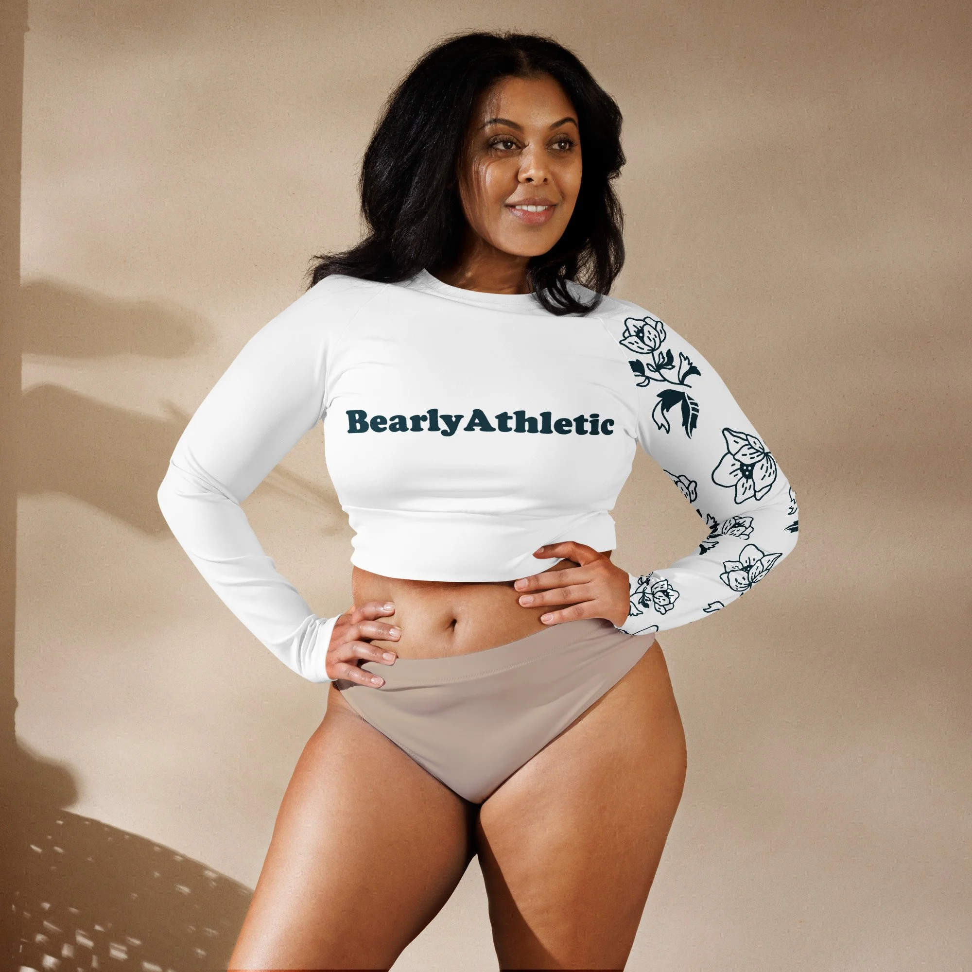 all-over-print-recycled-long-sleeve-crop-top-white-front-6a888ae714483.jpg
