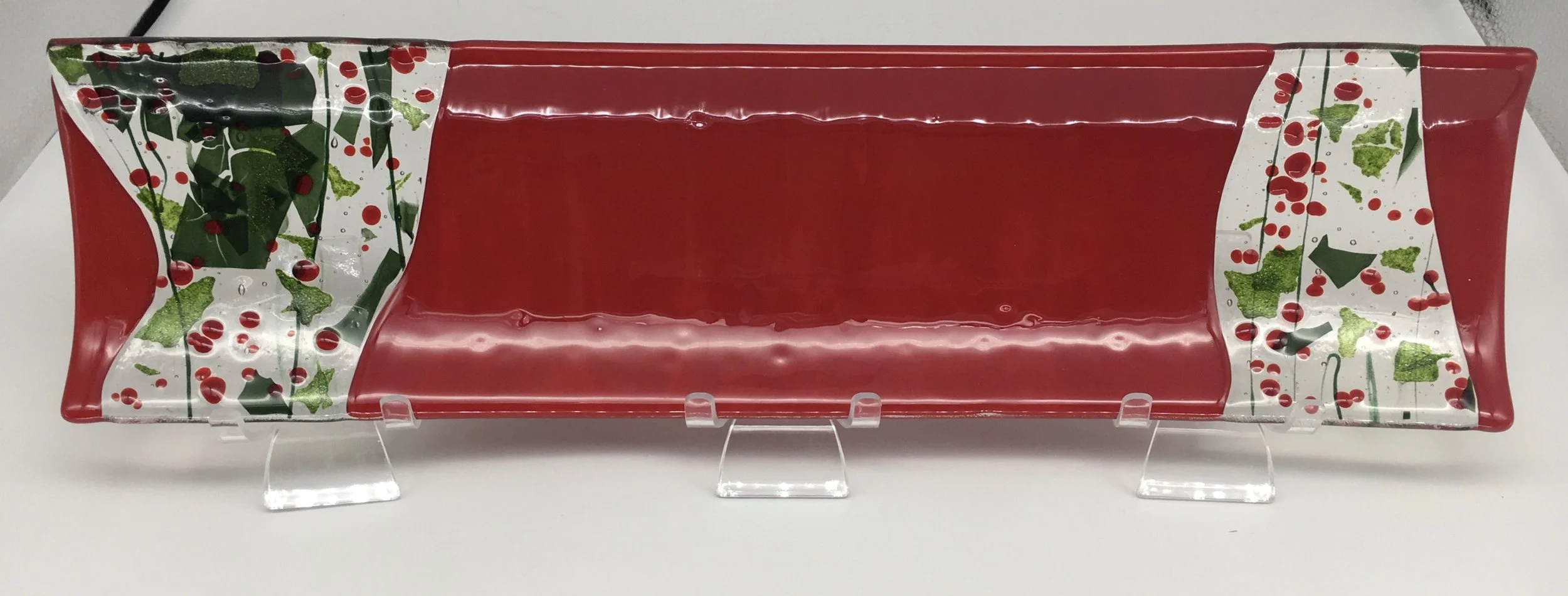 Red opaque with Holly Berry Insets.                   17" x 4.5 " $90 Sold