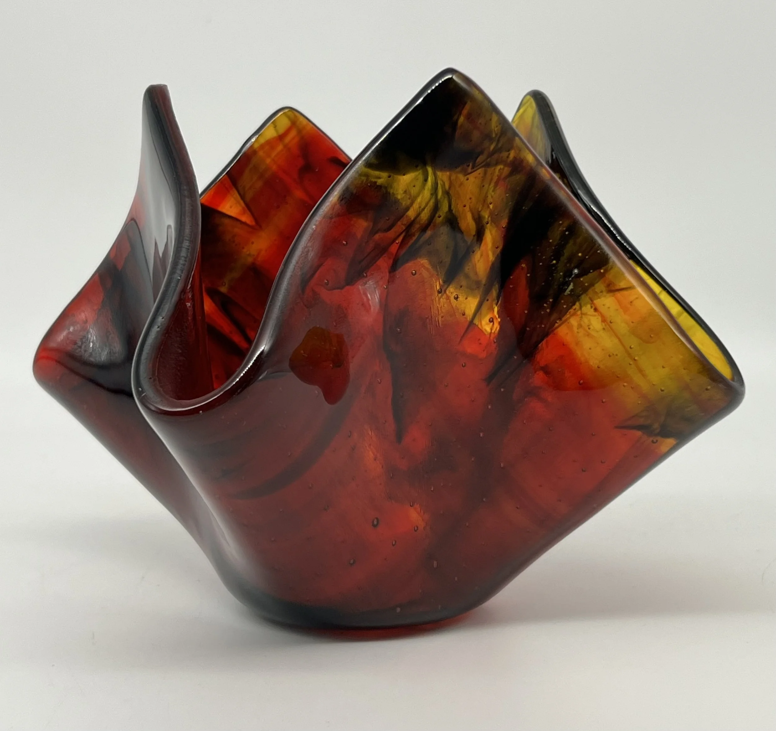 Red and Yellow streaky glass layered with Black and Clear Streaky glass candle holder $50 - 
