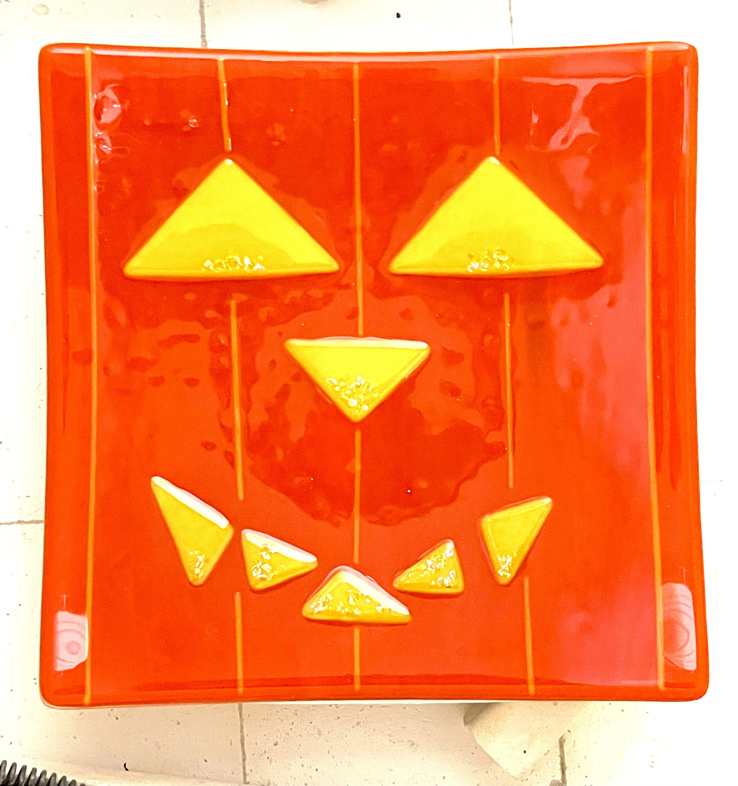 Orange Opaque with Yellow and dichroic accents Jack-o-lantern plate  8.5" square $55