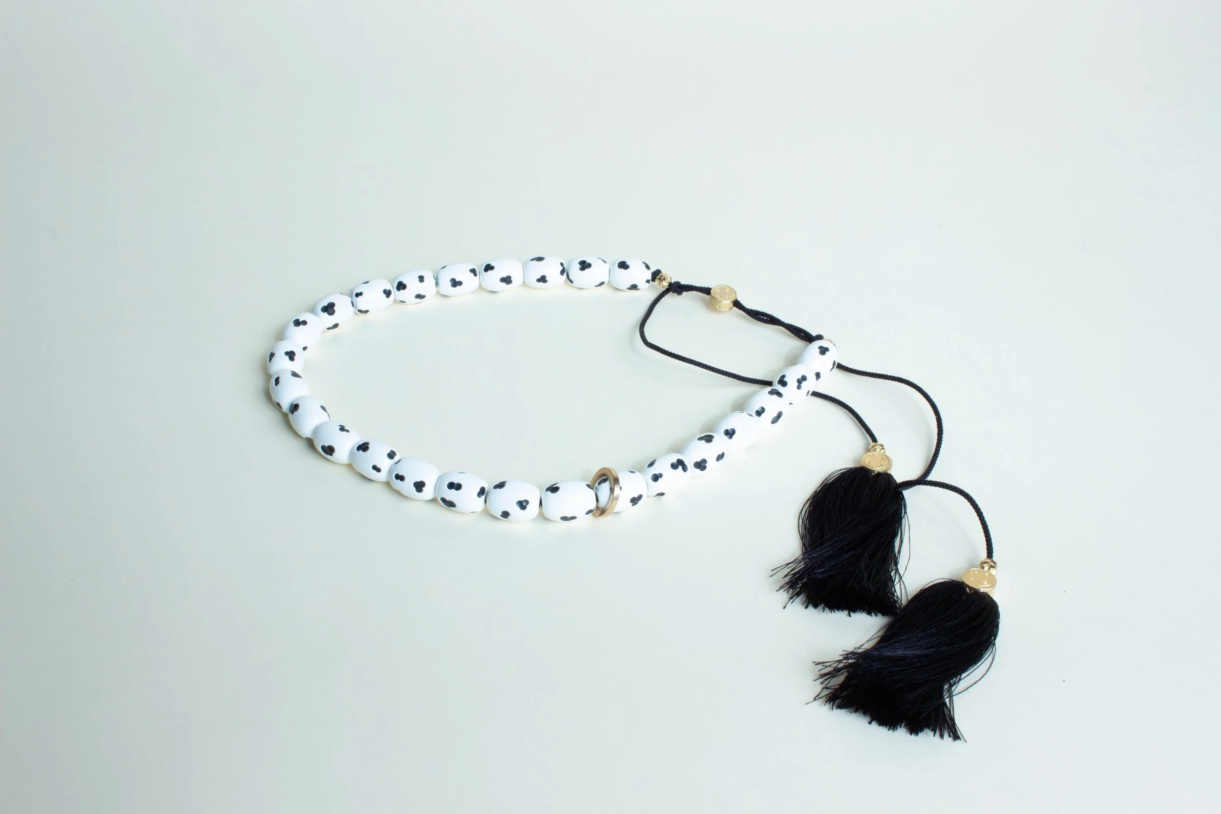 Carved-WB-Gold-Tassle.jpg