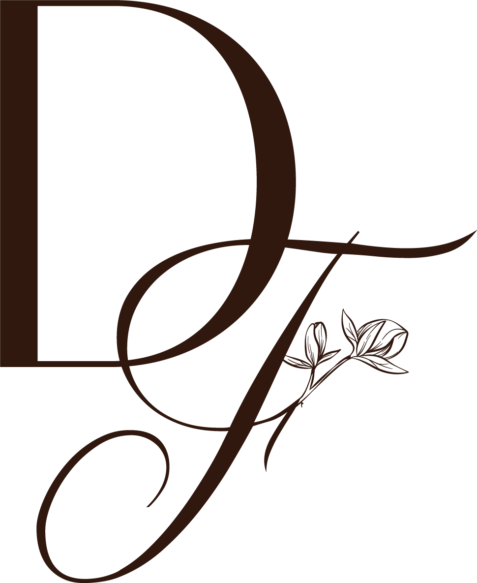 Stylized letter G with decorative flourishes and a small floral element on a black background.