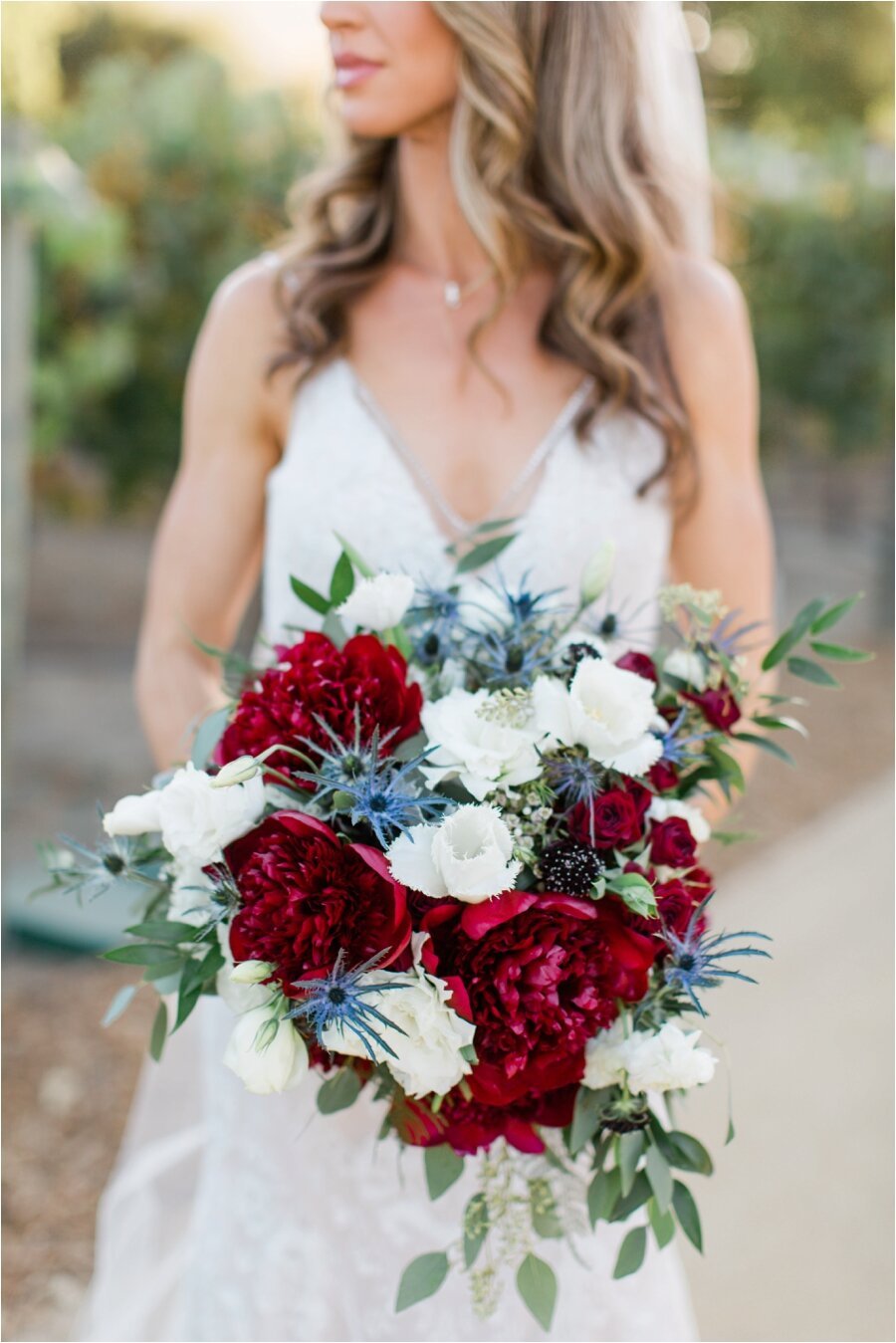 Bride holds her wedding bouquet by Casi Cielo Events