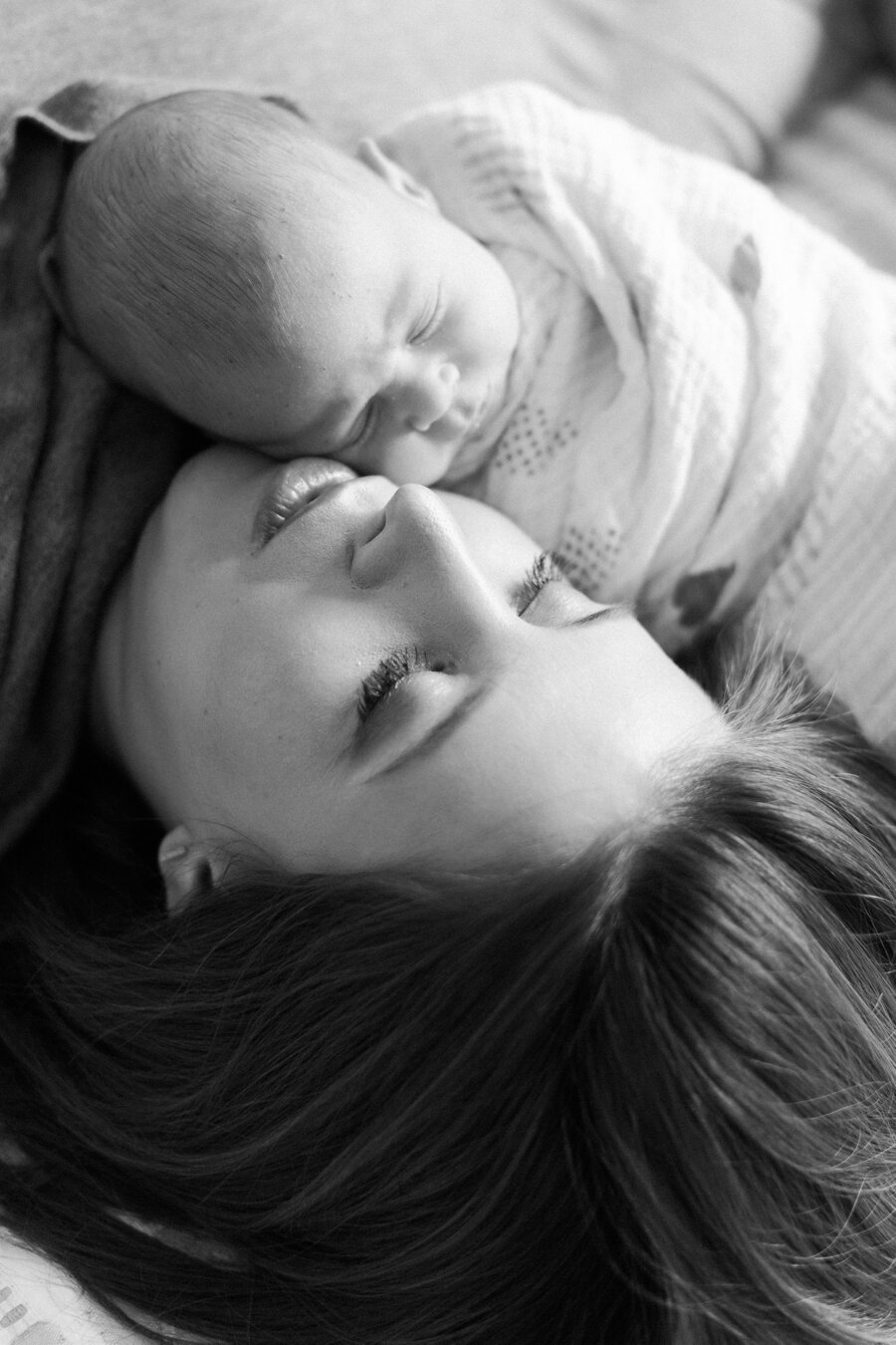 black and white newborn pose