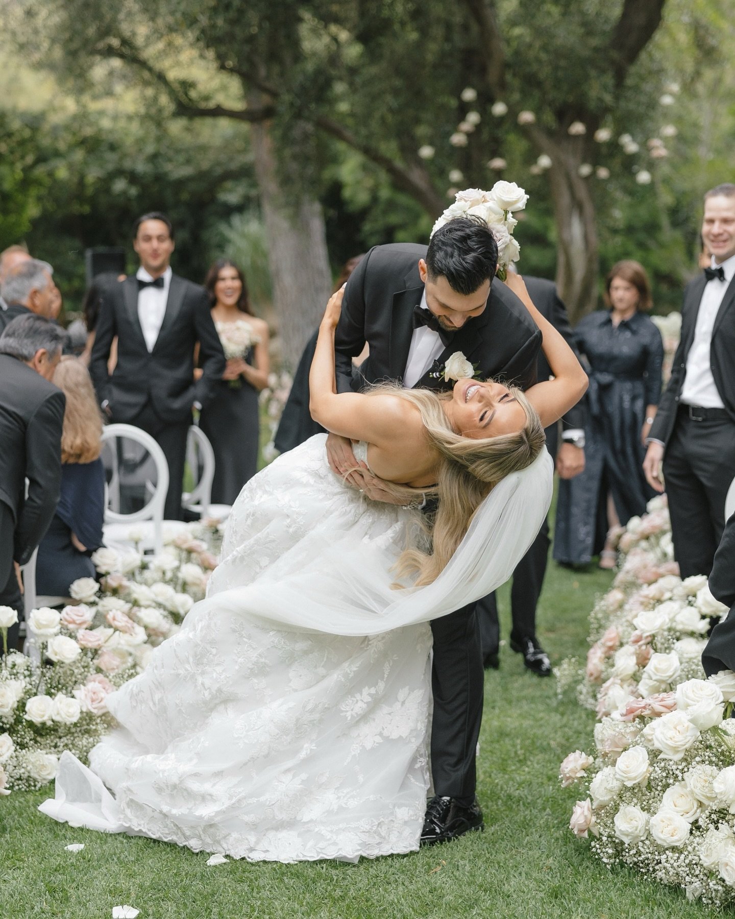 To say Alex and Olivia&rsquo;s wedding day was unforgettable would be an understatement. From Olivia&rsquo;s stunning @moniquelhuillierbride gown to the crystal chandeliers that adorned the candle lit reception space, this black tie affair, planned t