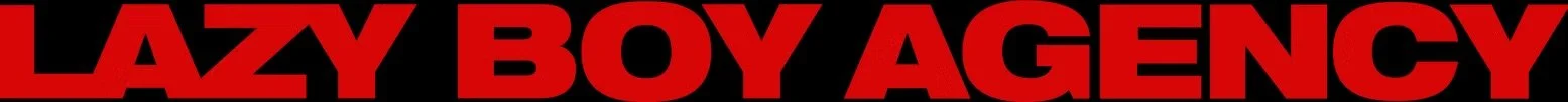 Text that reads "LAZY BOY AGENCY" in bold red letters on a black background.