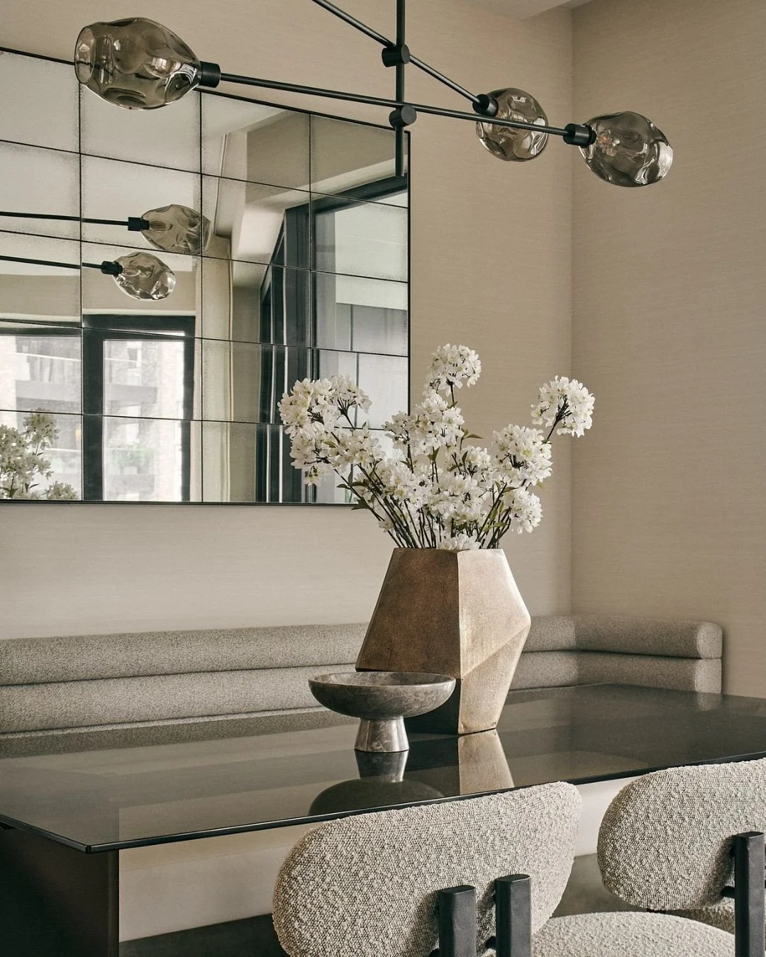 The dining area in our latest Nine Elms project is centred around a beautifully crafted fitted bench, featuring an elegant fluted back and a liquid brass plinth. It&rsquo;s a great example of how thoughtfully designed fitted furniture can elevate a s