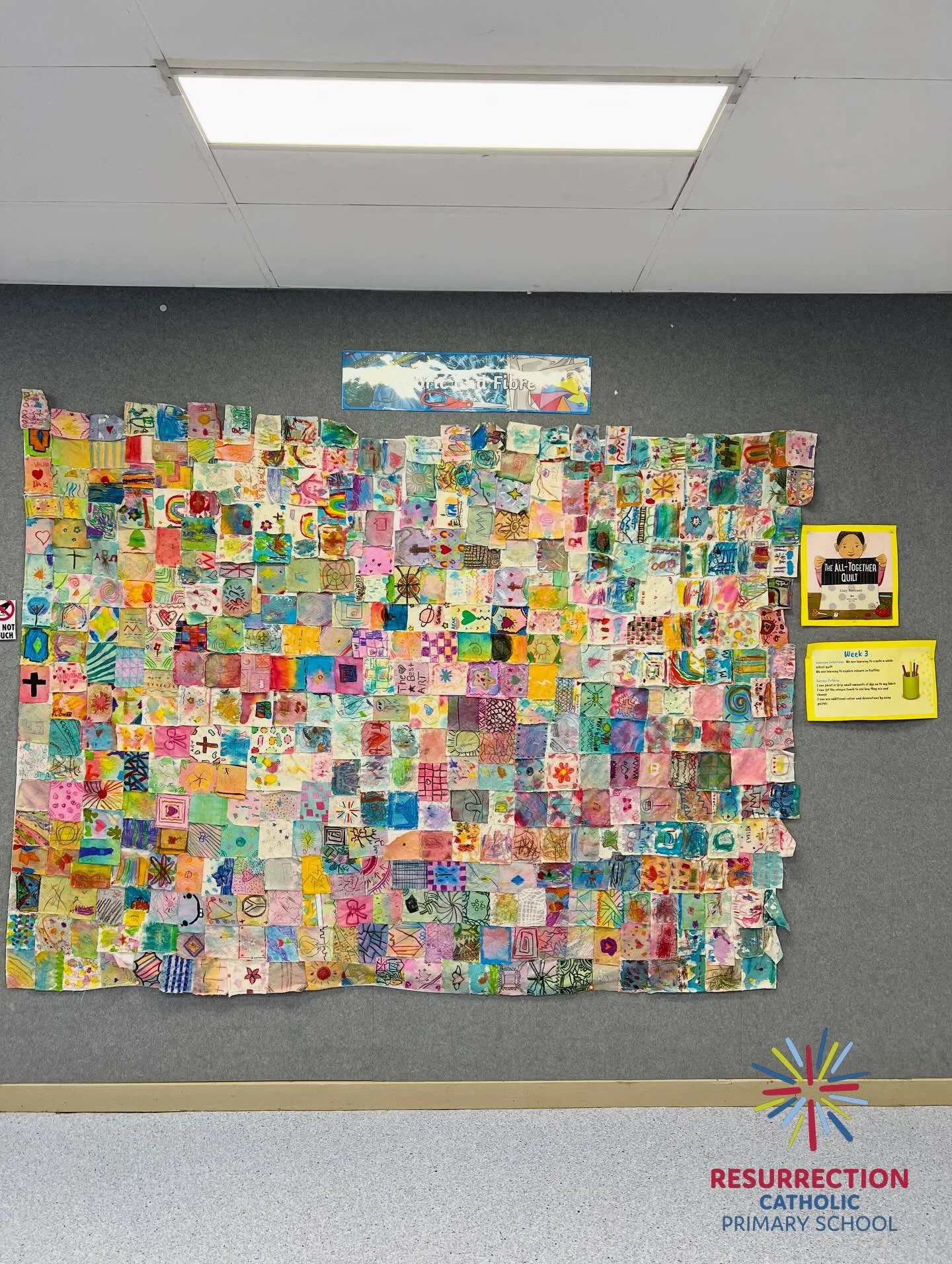 The Resurrection &lsquo;All Together Quilt&rsquo;, featuring squares from every child in the school. Inspired by the book of the same name by Lizzy Rockwell, students explored using different mediums and colours on textiles with Mrs Kaan and Ms. La R