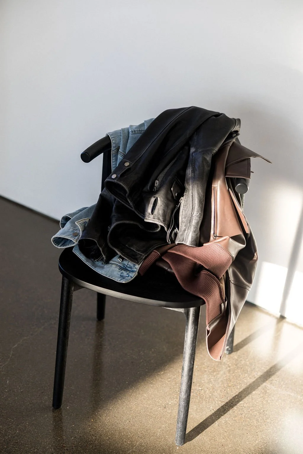 A chair styled and curated by Kathryn Snow, personal stylist, fashion expert, and wardrobe consultant in Grand Rapids, Michigan