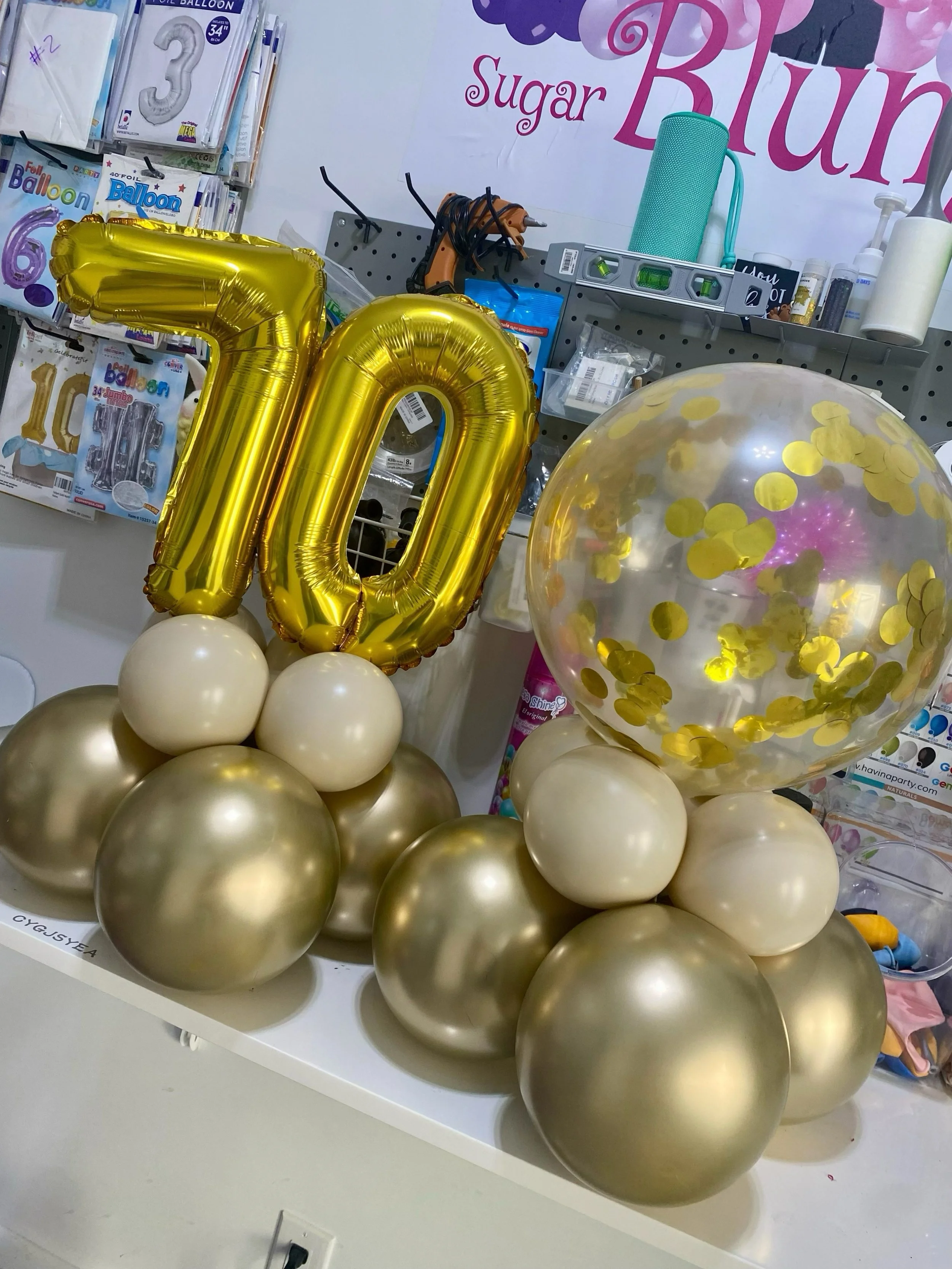 tierd balloons, centerpiece, balloons, balloons near me, balloon centerpieces, gold balloons, grab and go balloons, pickup balloons, milestone balloons