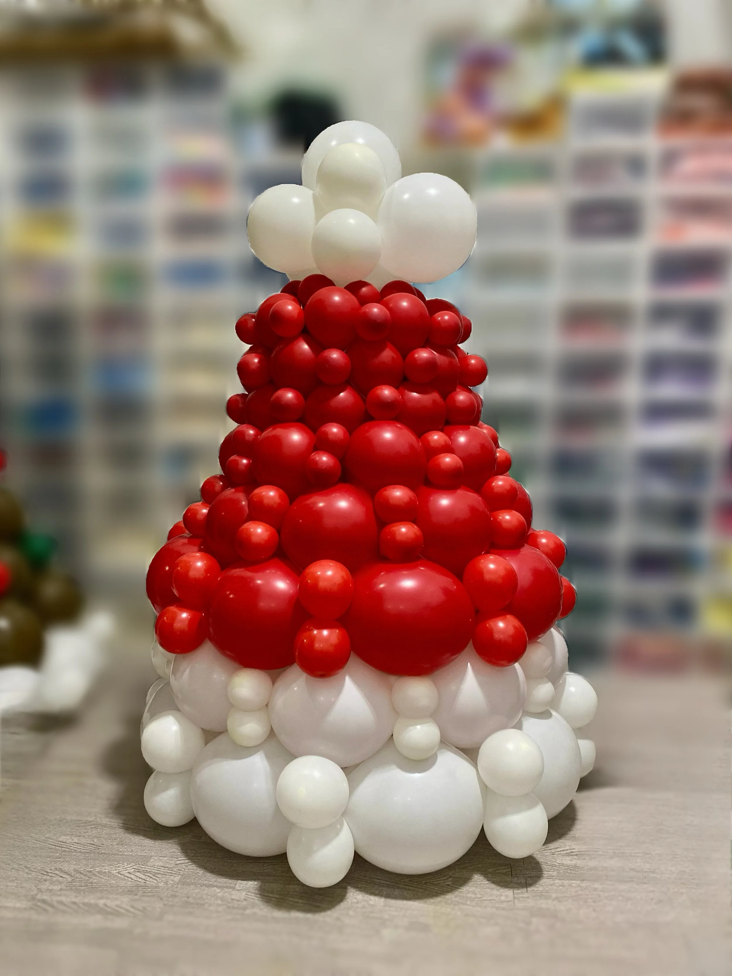 christmas decorations, christmas balloon arch, holiday decoration, candy cane theme, red green and gold decorations, balloons, balloons near me, party, events