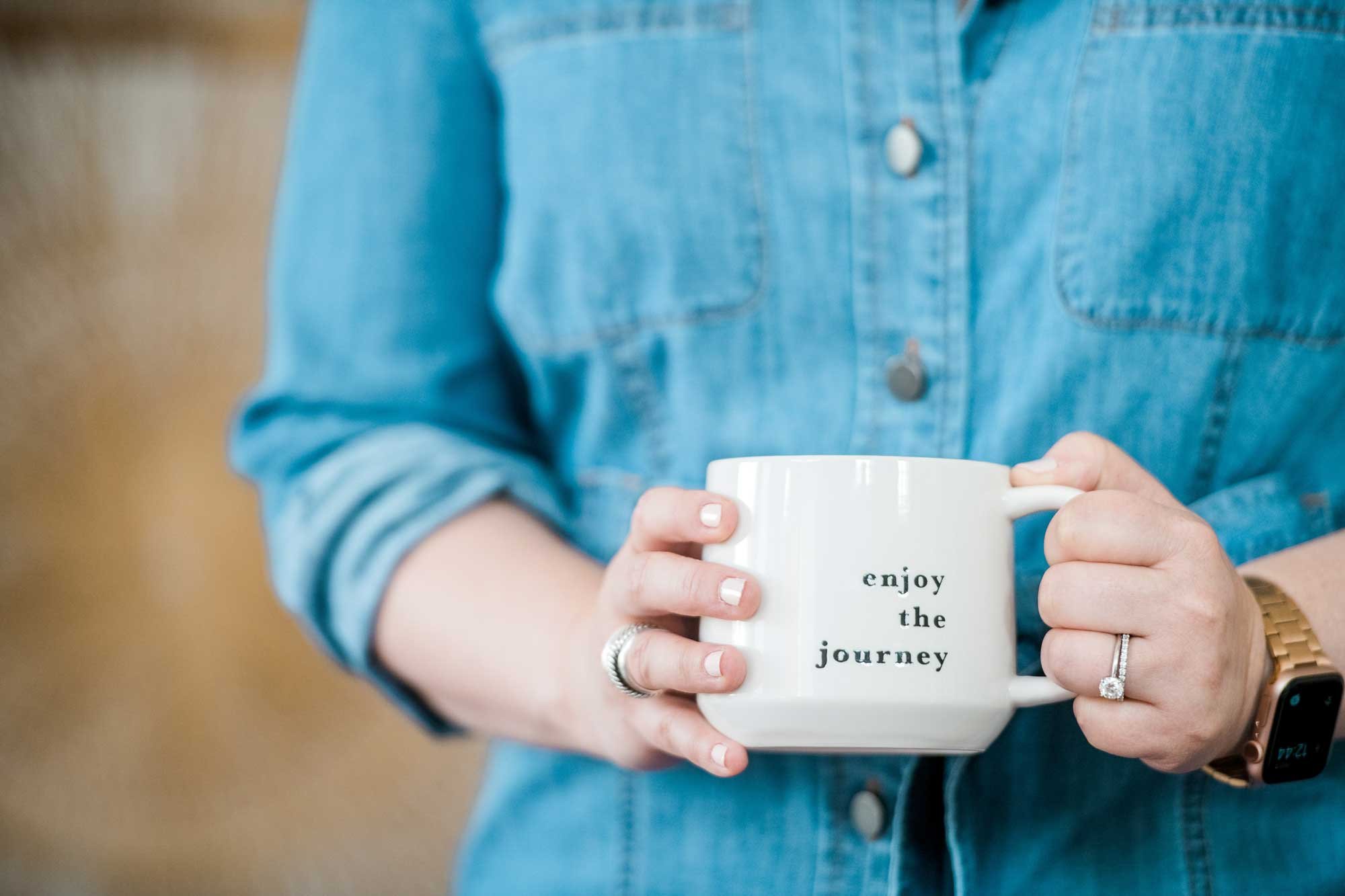 Kara Friedman's coffee mug "enjoy the journey"