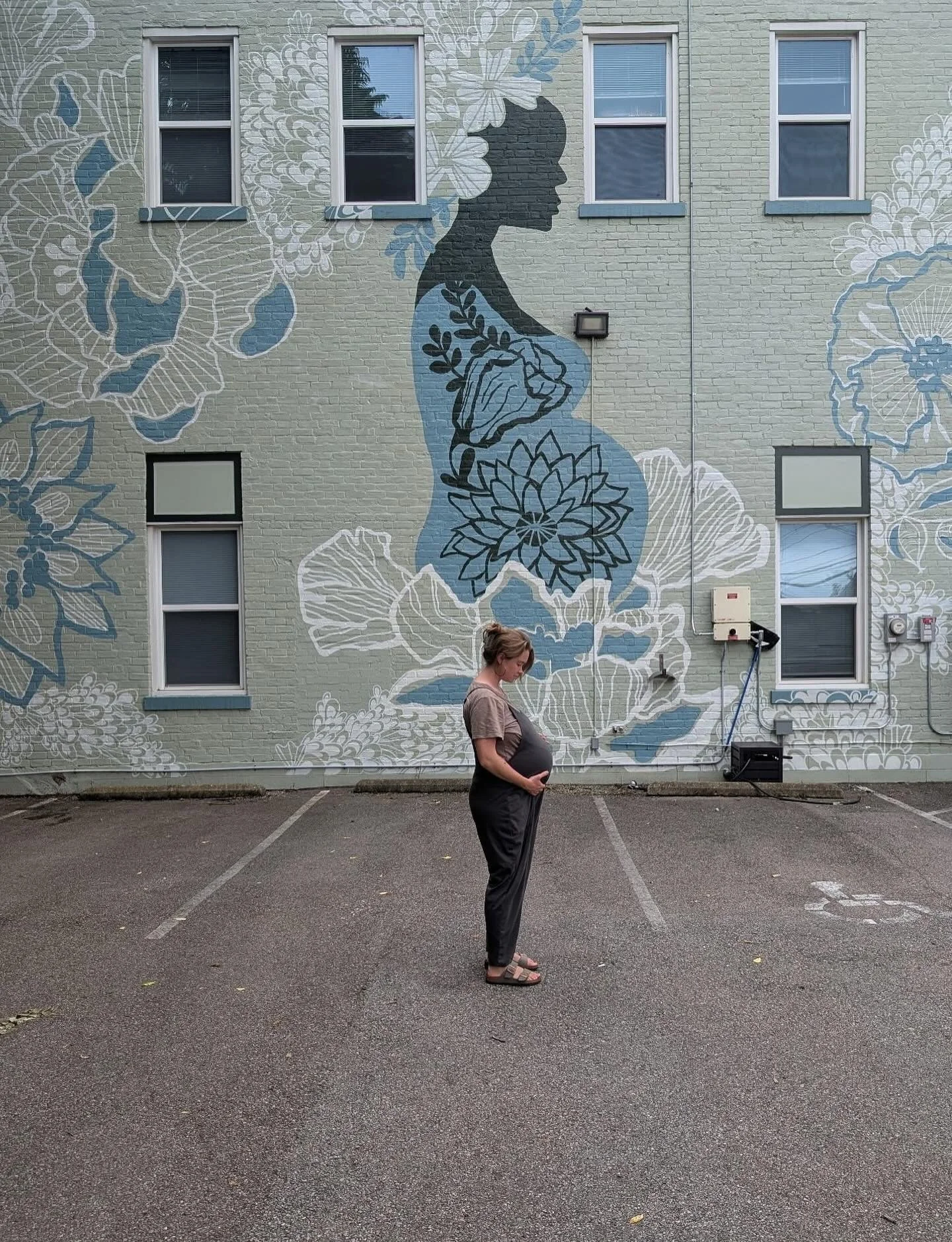 Woke up this morning thinking about this picture with my mural that the *love of my life* @ao.birthdoula sent me of her (and baby Ada!) a few months back. This is the gift and joy of public art&hellip;. it continues to have new meaning and interactio