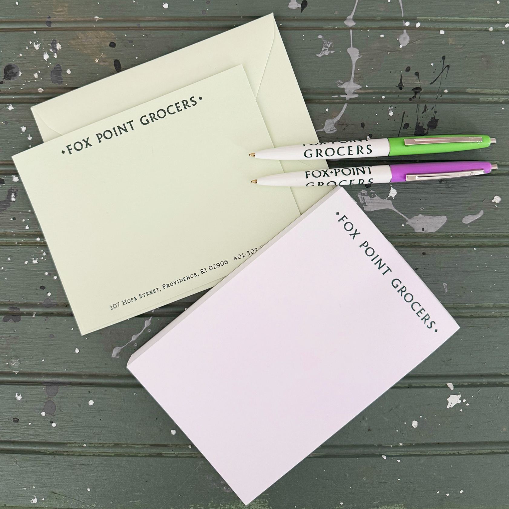 Notecards, notepad and pens - all branded merch for Fox Point Grocers