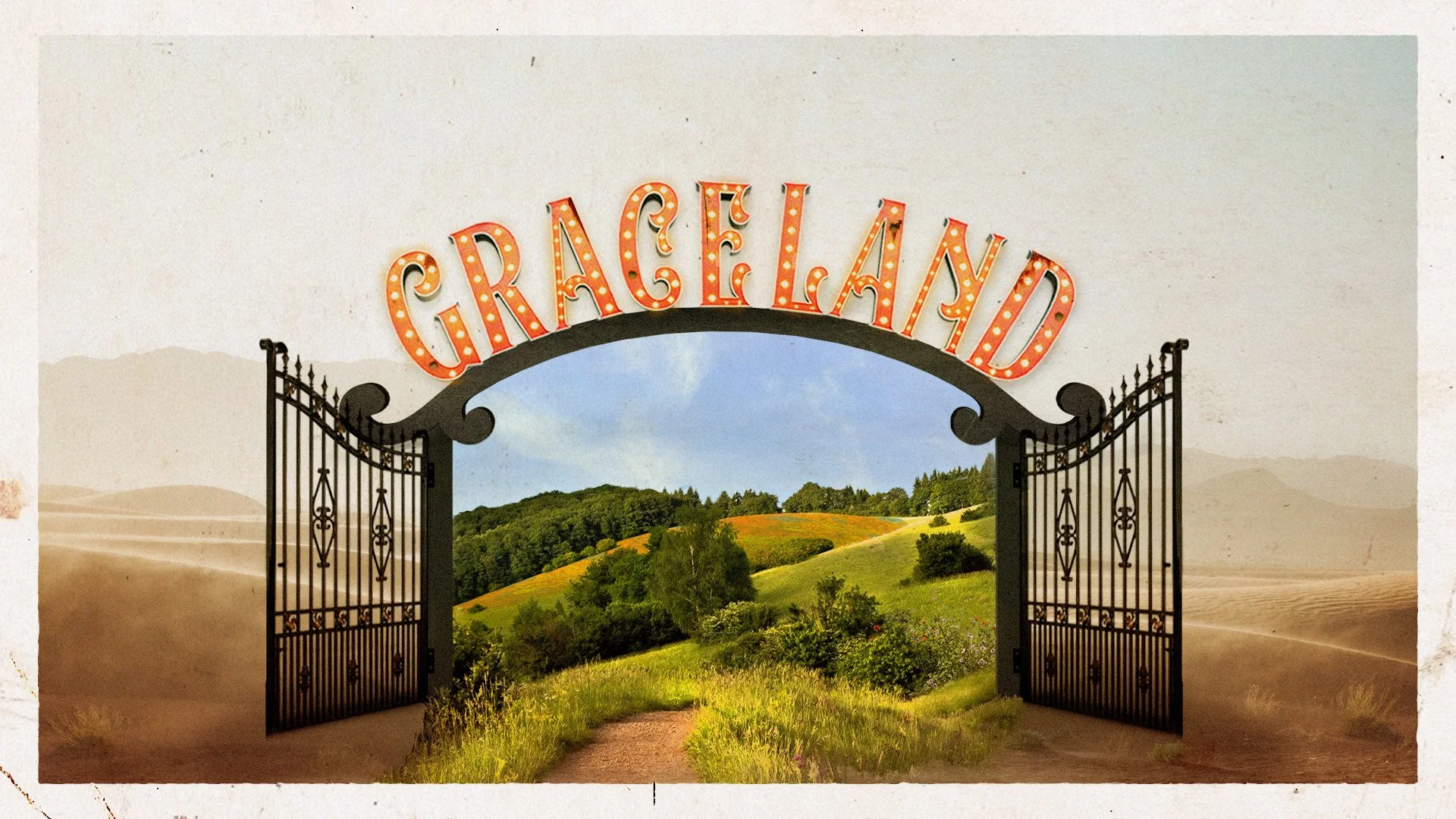 Open iron gate leading to green rolling hills with trees and bushes under a blue sky.