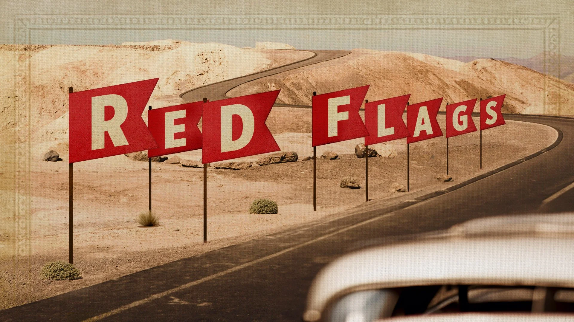 A desert landscape with a winding road and a series of red flags spelling out "RED FLAGS" along the road.