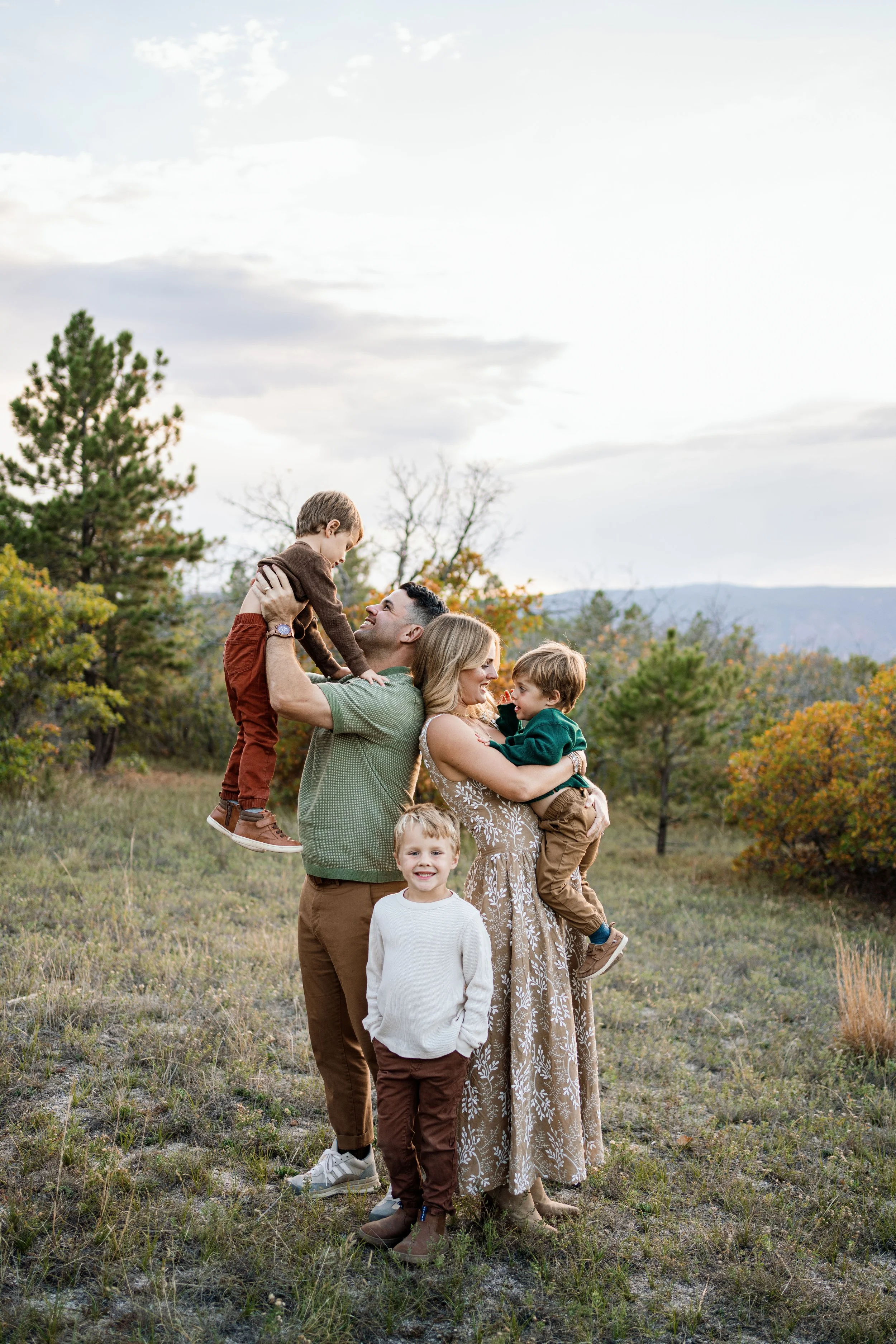 outdoor family session in castle rock. candid golden hour session with little boys
