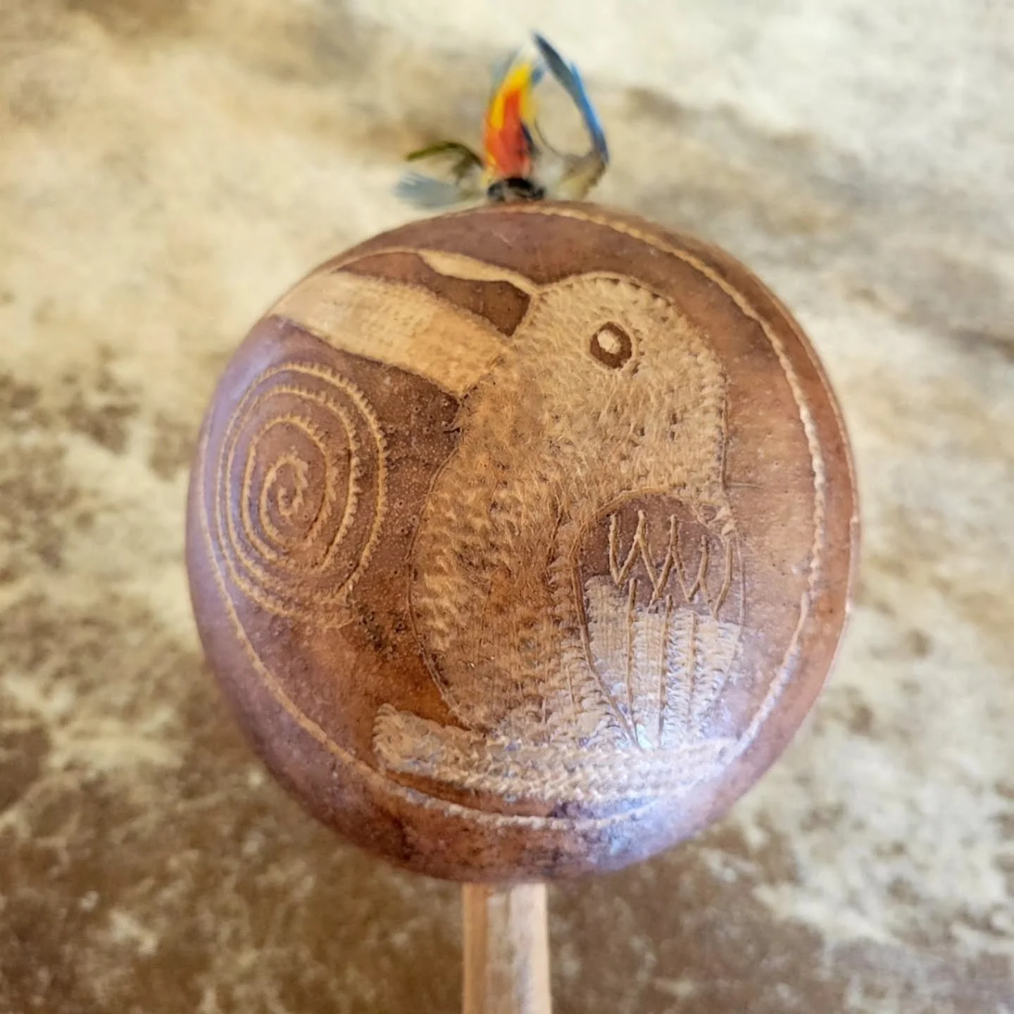A shamanic rattle is a sacred, handheld instrument used for healing, clearing energy, journeying and meditation.