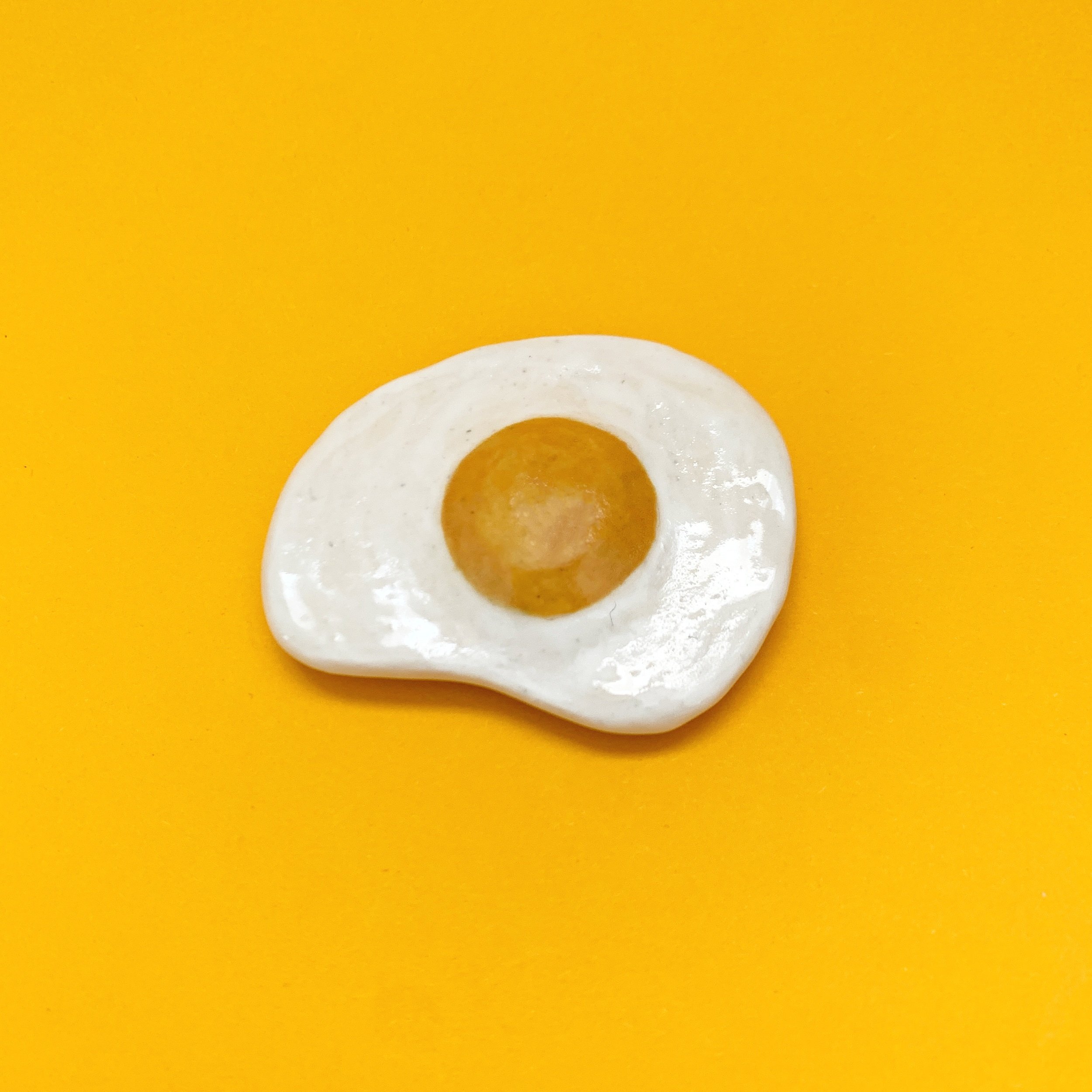 Egg+on+yellow.jpg