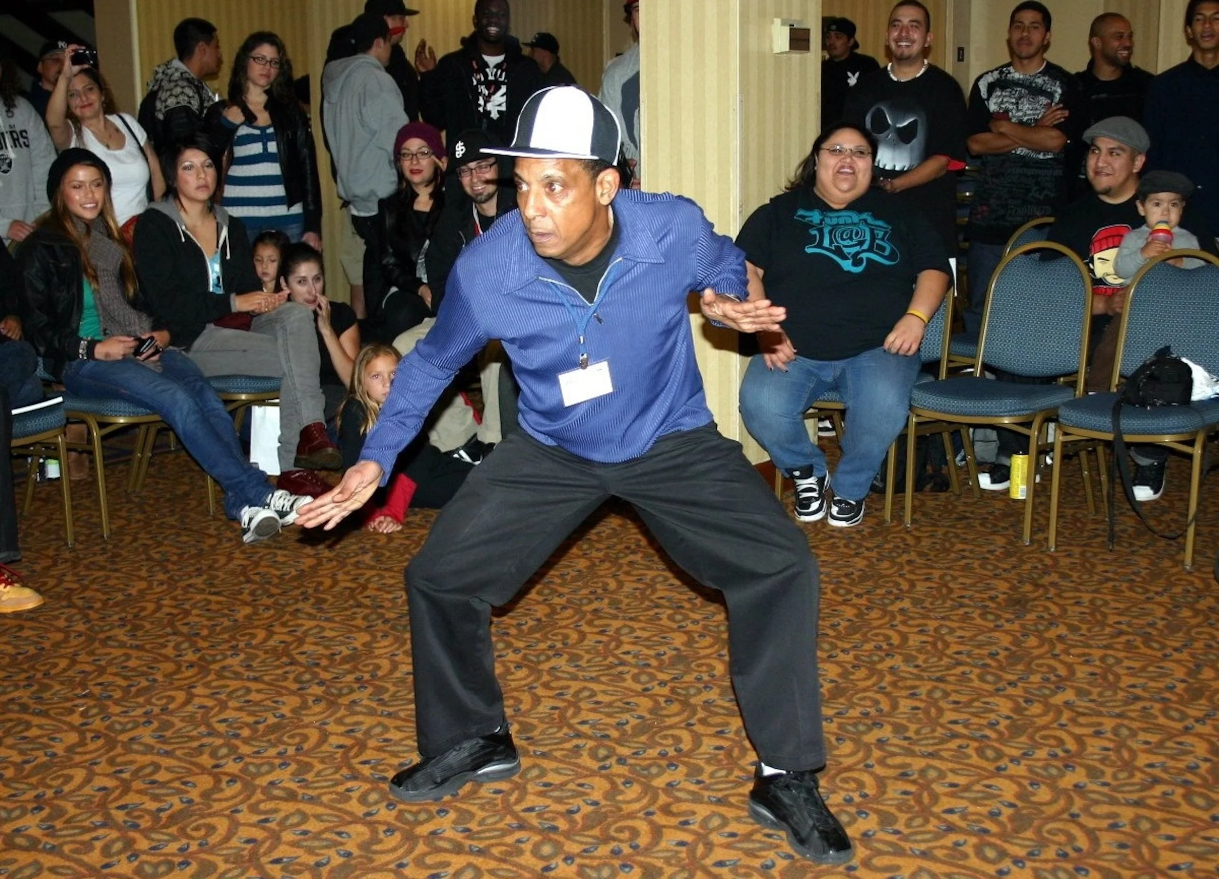 Jerry "The Worm" Rente, pioneer of the West Coast Boogaloo, performing at a conference, 2010s. Courtesy of Jerry Rente.