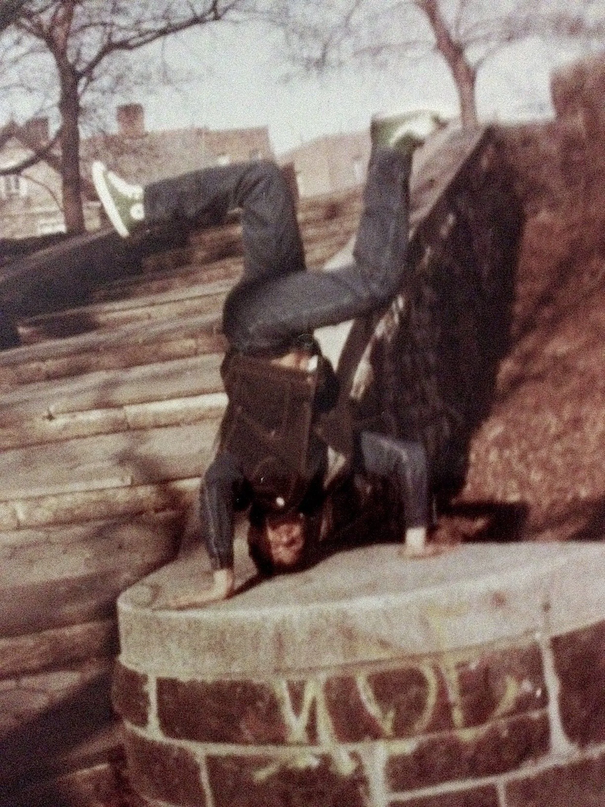 Aby, president of The Bronx Boys/The Bronx Girls Rocking Crew, doing a headstand in Crotona Park, 1977. Courtesy of Aby.